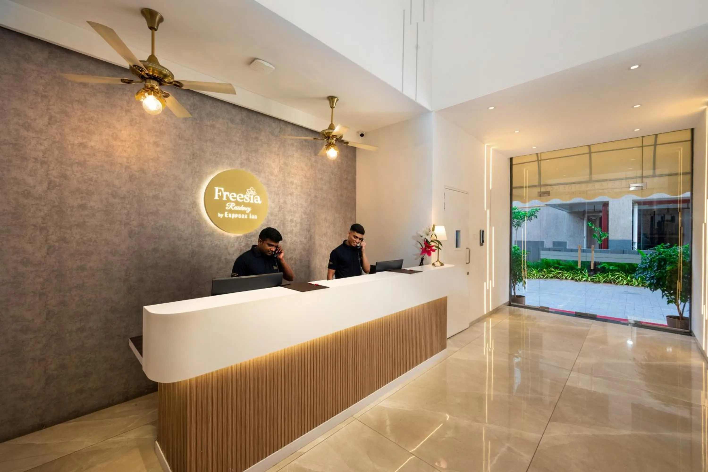 Staff in Freesia Residency By Express Inn - Navi Mumbai