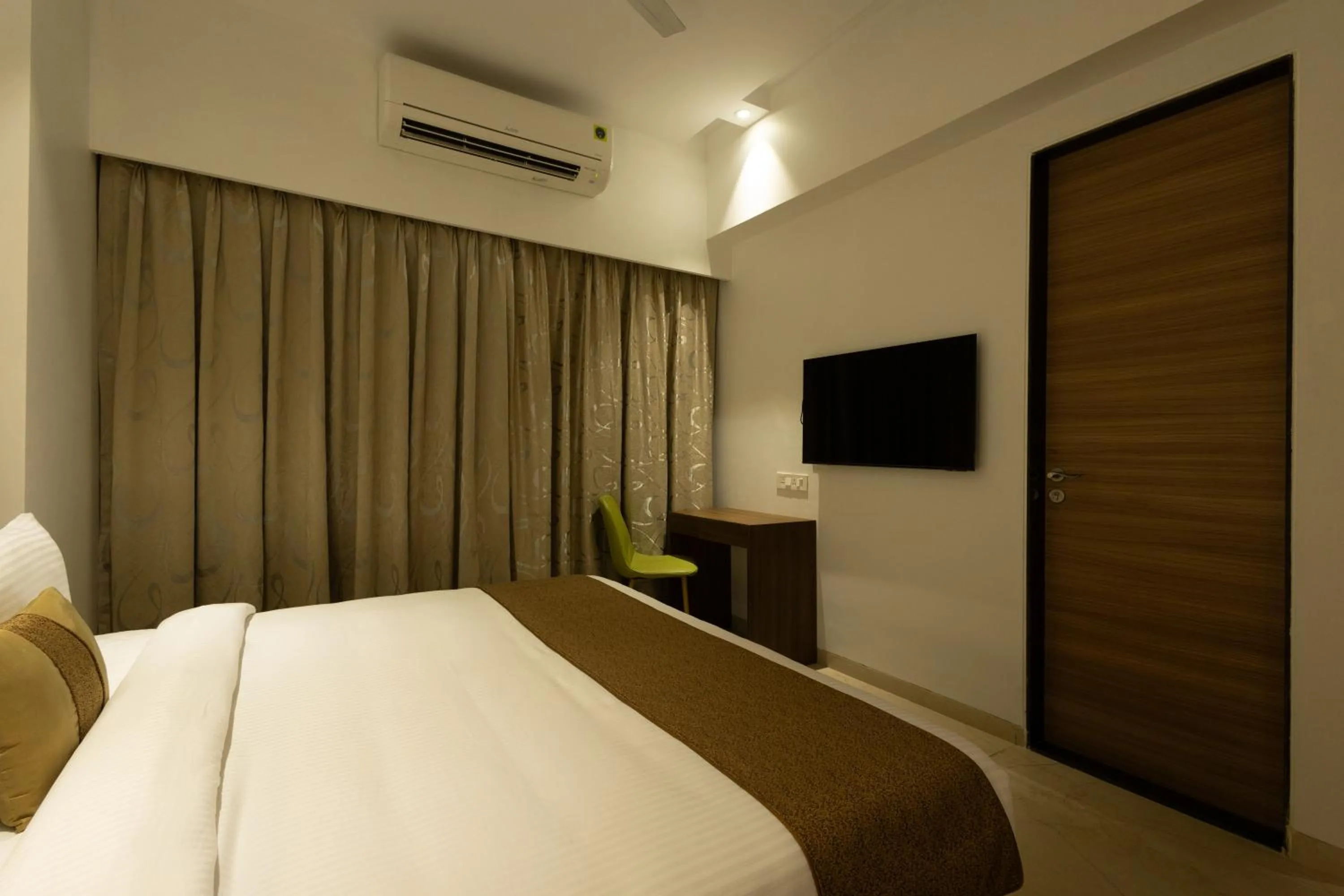Bedroom, Bed in Freesia Residency By Express Inn - Navi Mumbai