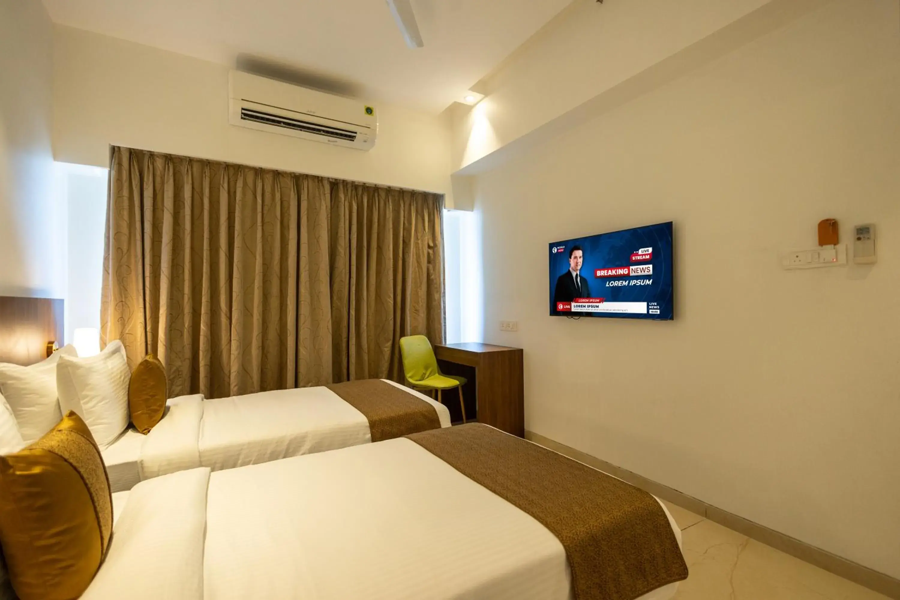 Communal lounge/ TV room, Bed in Freesia Residency By Express Inn - Navi Mumbai Communal lounge/ TV room, Bed in Freesia Residency By Express Inn - Navi Mumbai