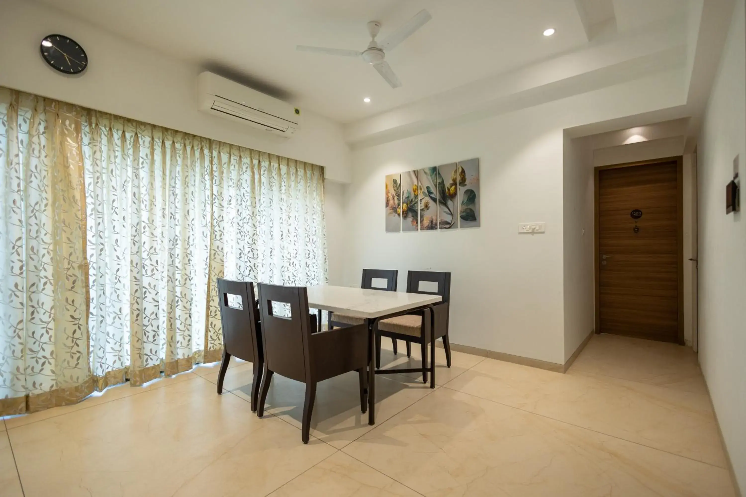 Living room in Freesia Residency By Express Inn - Navi Mumbai Living room in Freesia Residency By Express Inn - Navi Mumbai