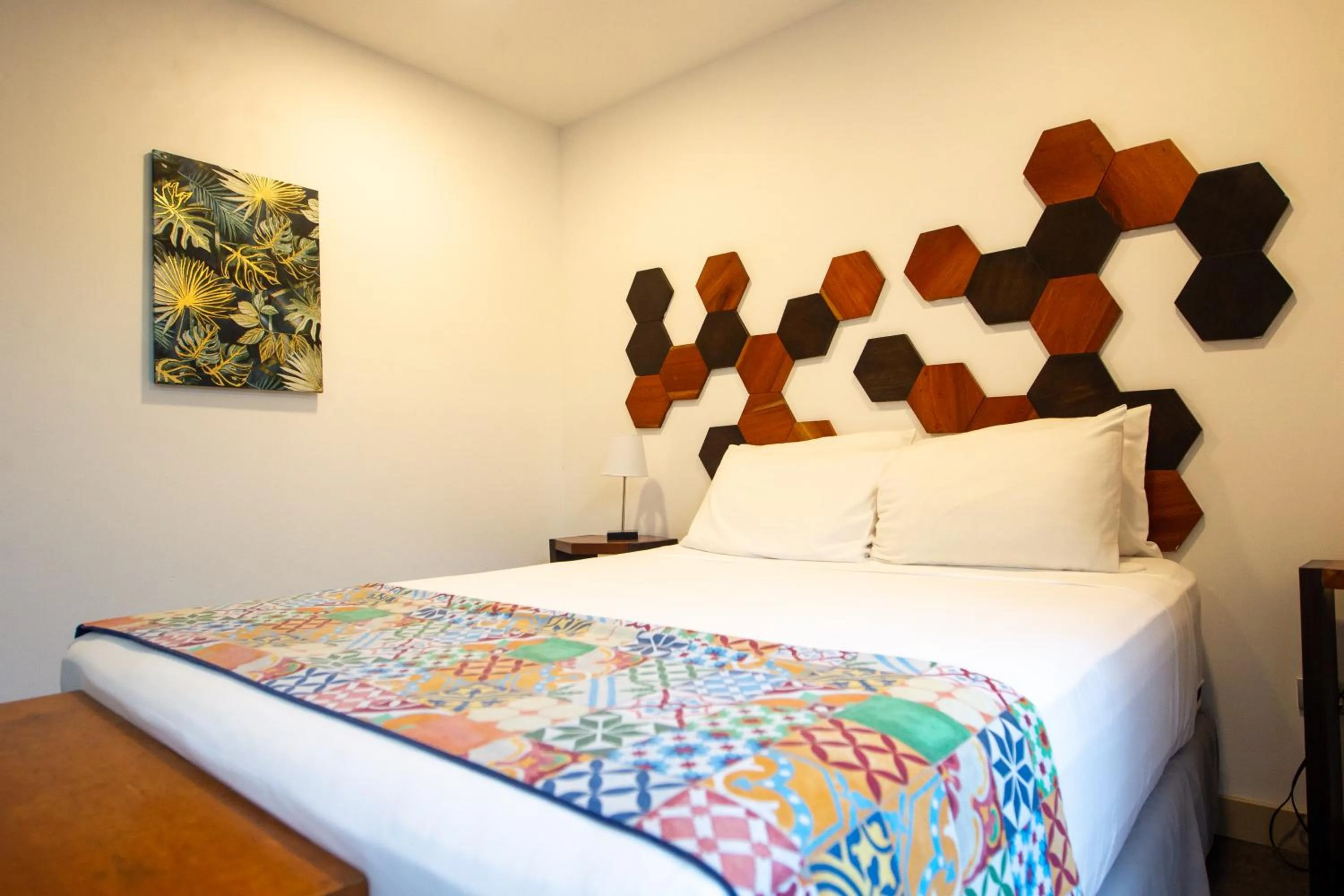 Bed in La Vela Boutique Hotel