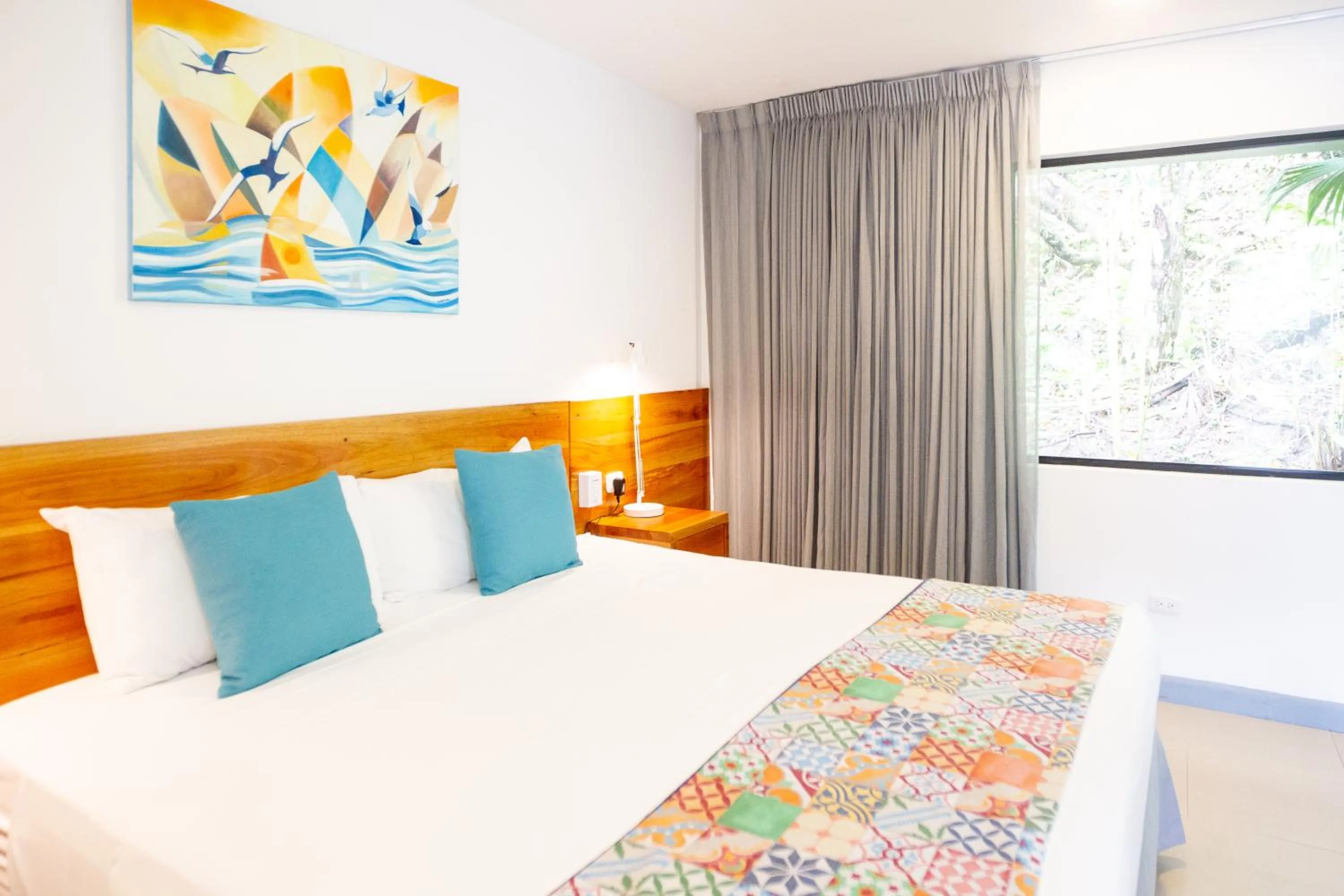 Bed in La Vela Boutique Hotel