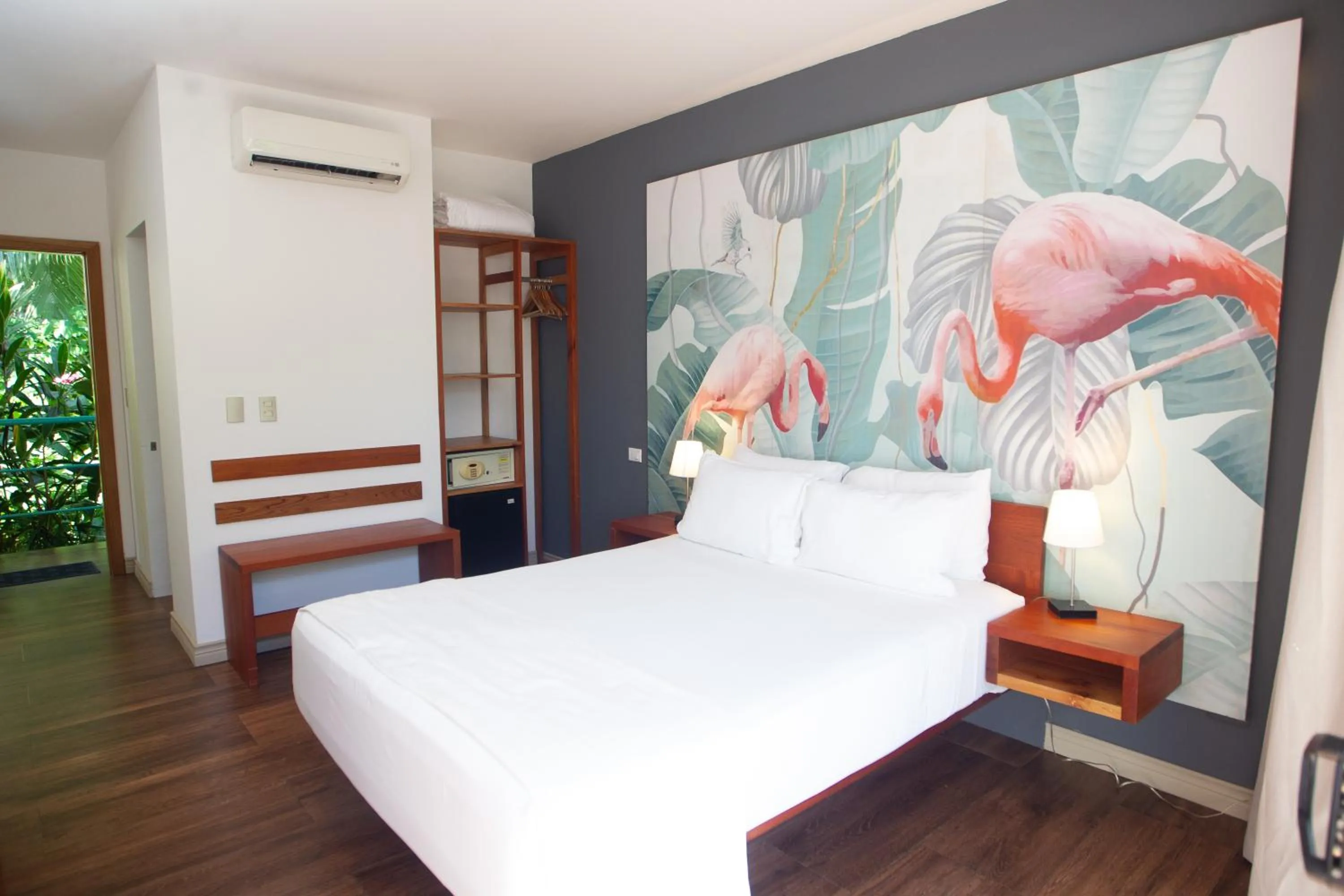 Bed in La Vela Boutique Hotel