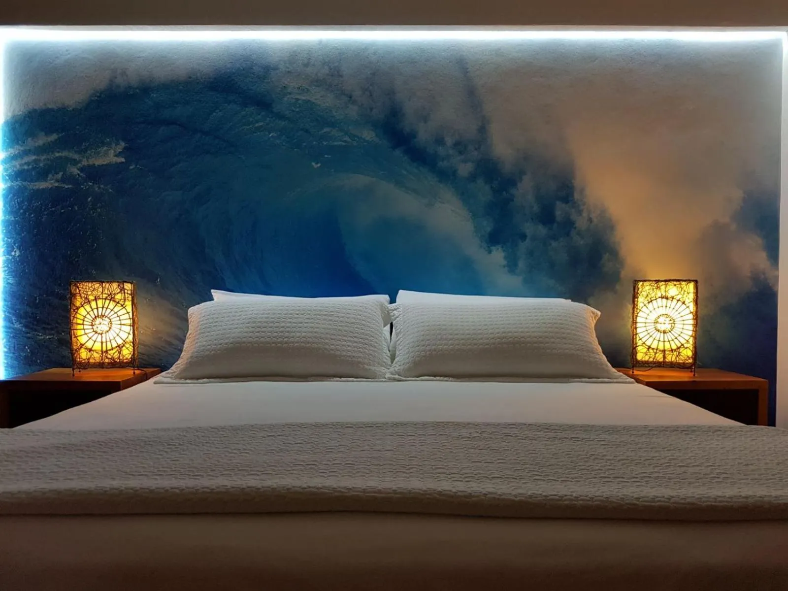 Bed in La Vela Boutique Hotel