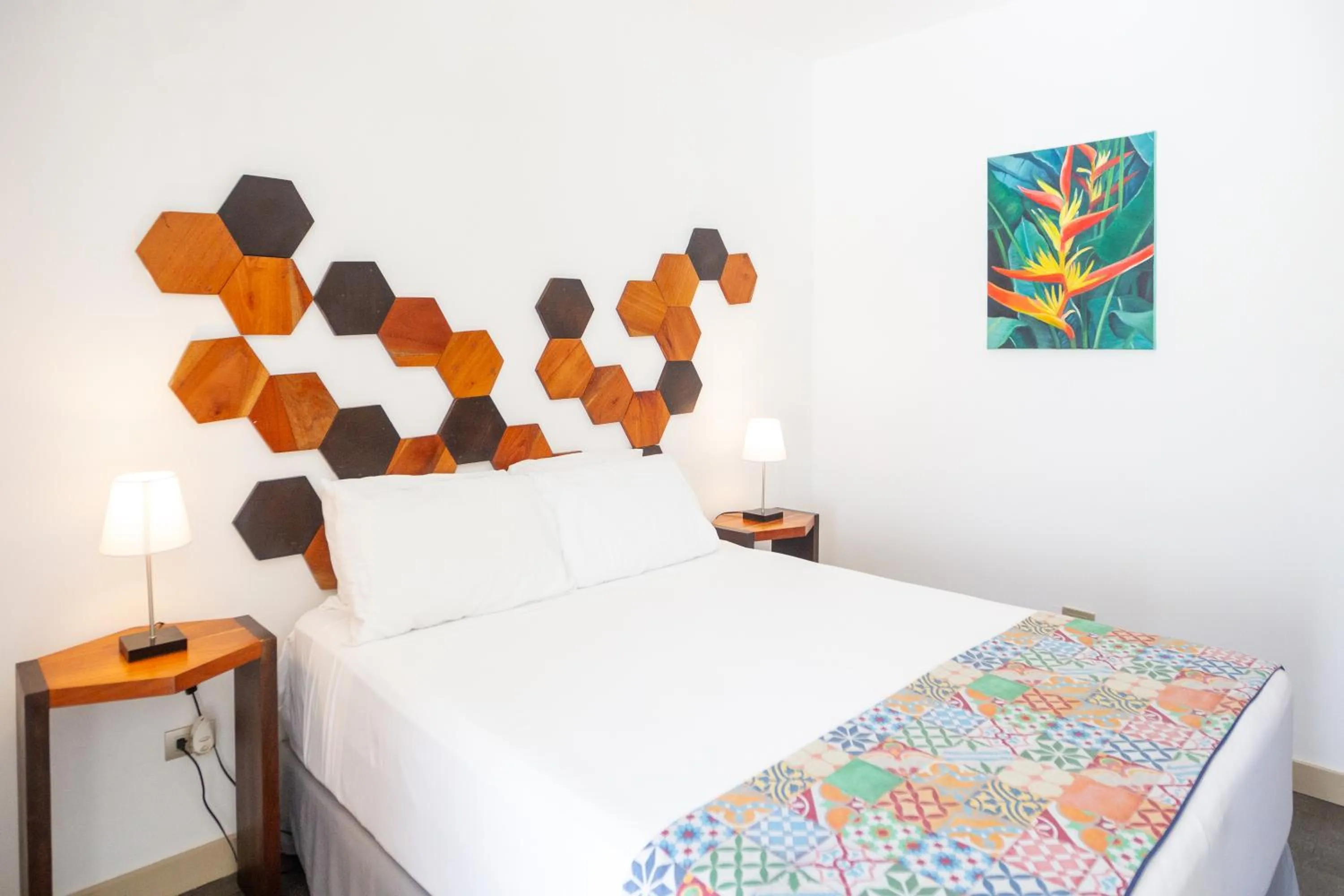 Bed in La Vela Boutique Hotel