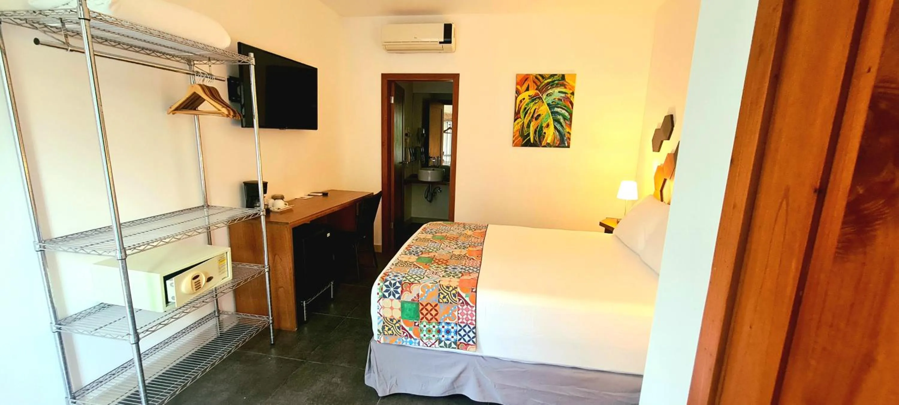 Bed in La Vela Boutique Hotel