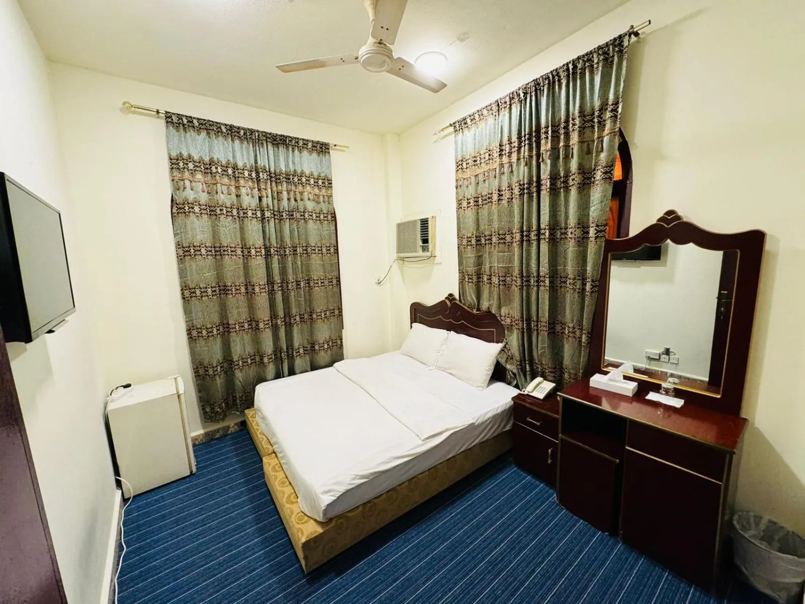 Bedroom in Al Wehda Hotel