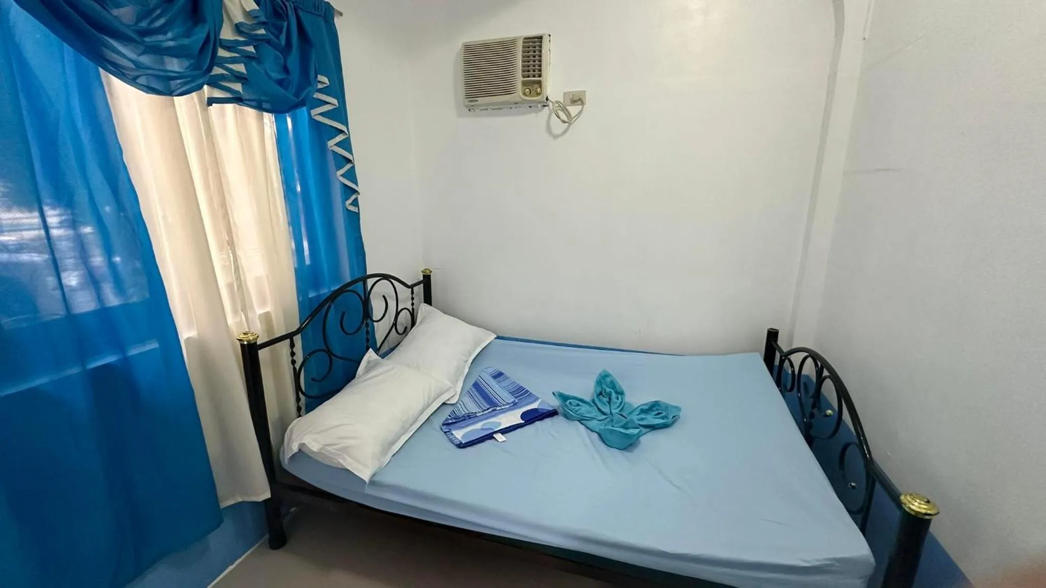 Bed in Acuaverde Beach Resort & Hotel Inc.