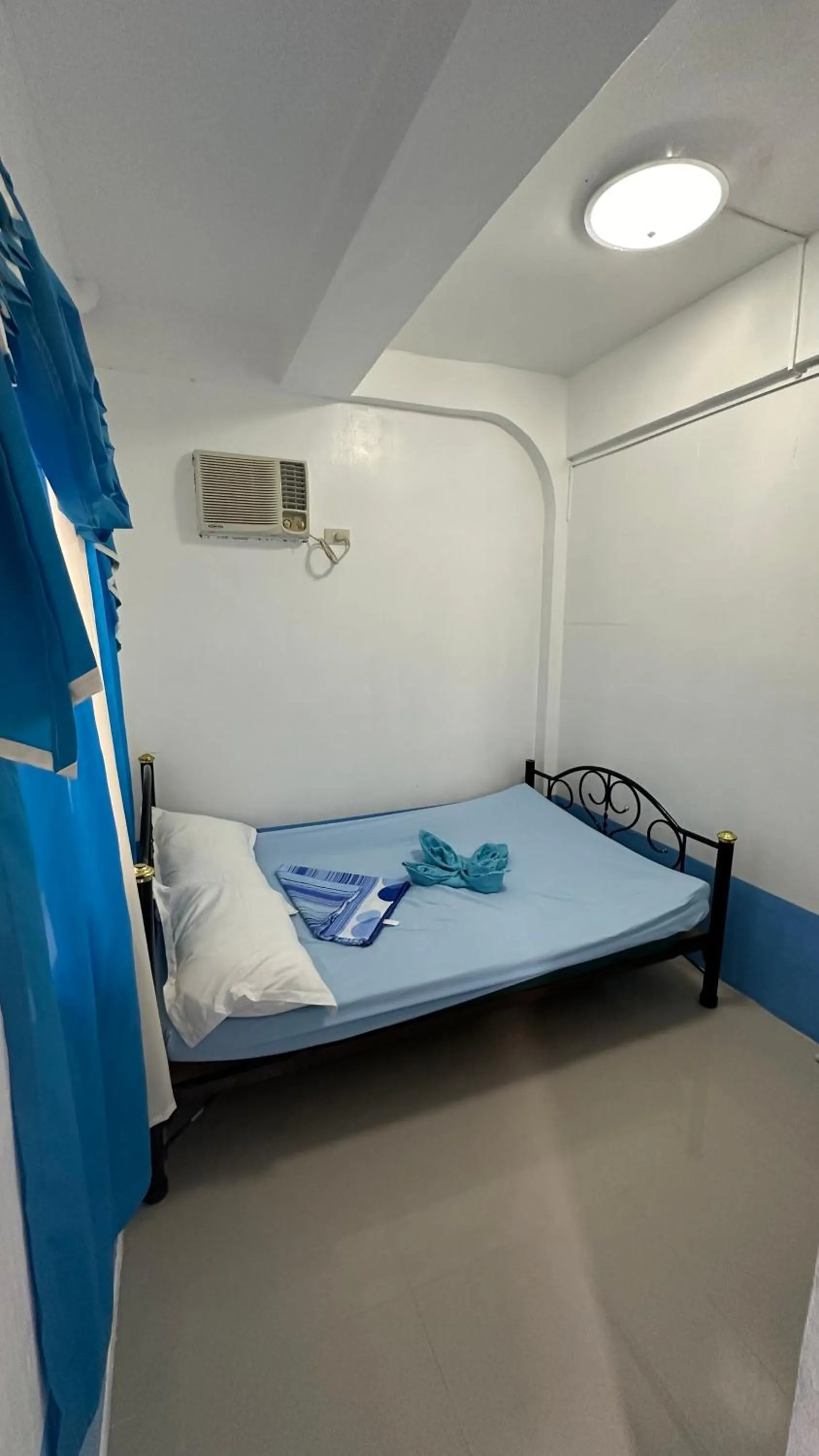 Bed in Acuaverde Beach Resort & Hotel Inc.