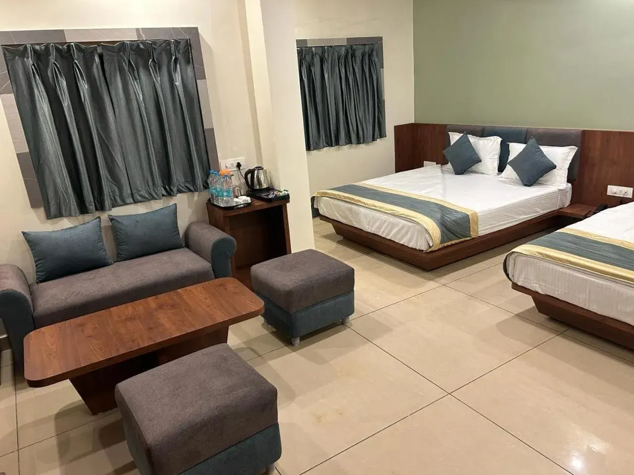 Living room, Bed in Hotel Omkareshwar Inn Living room, Bed in Hotel Omkareshwar Inn