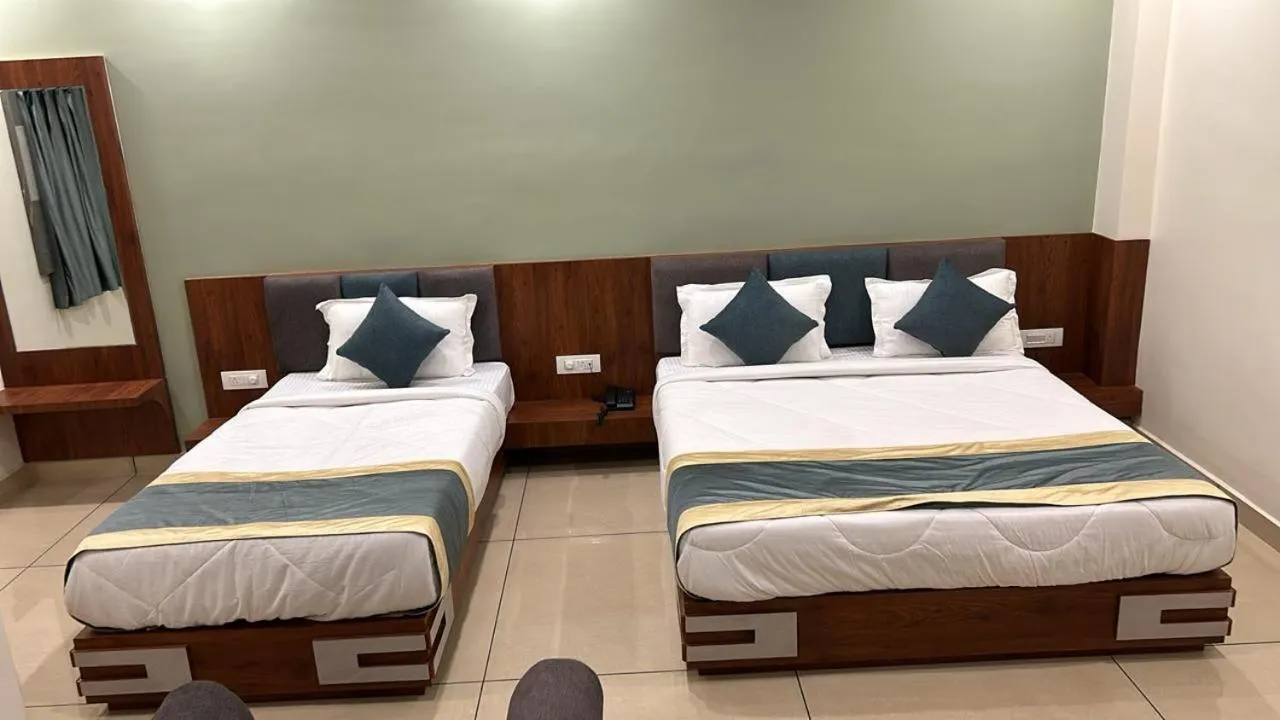 Bed in Hotel Omkareshwar Inn