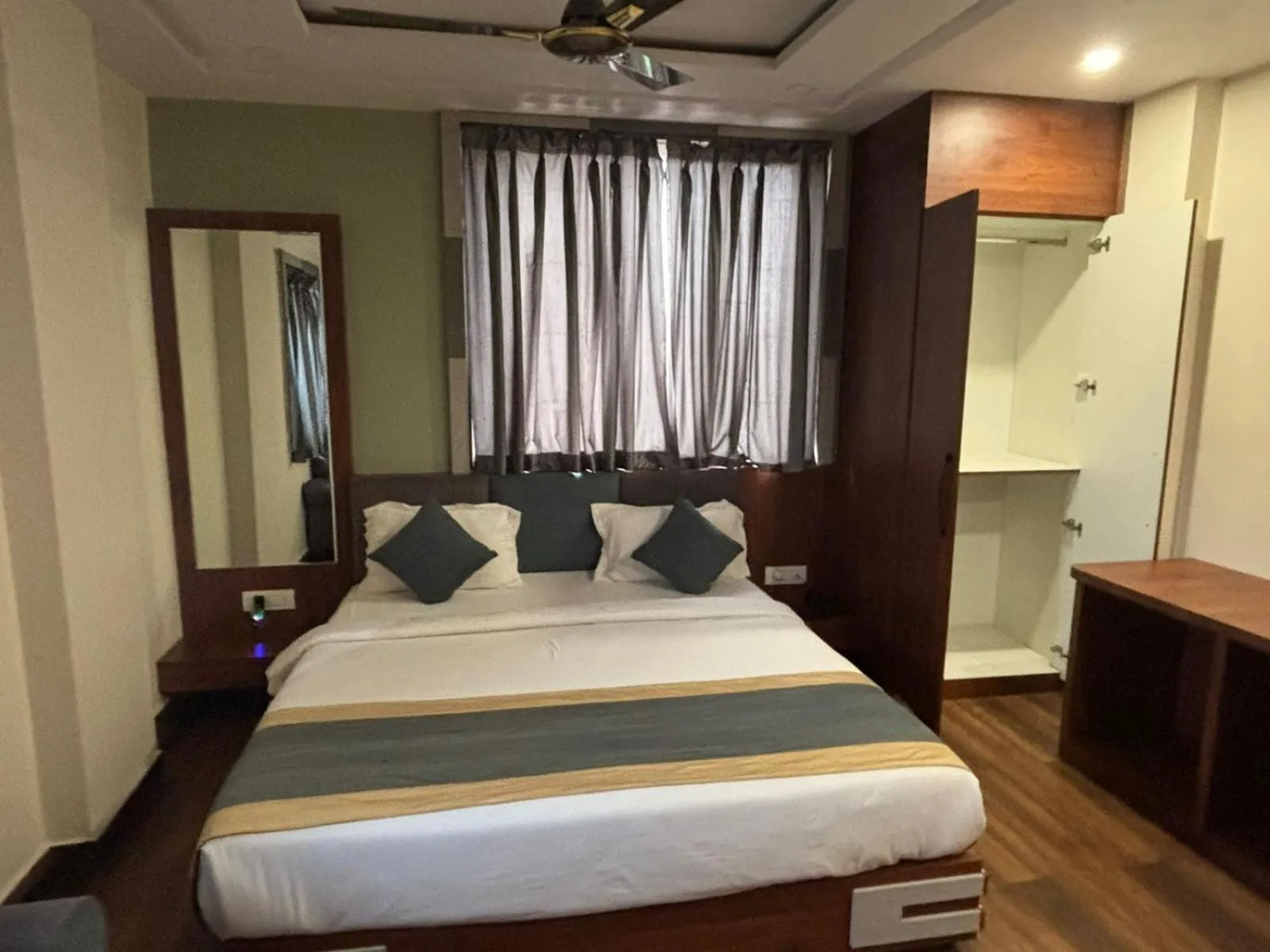 wardrobe, Bed in Hotel Omkareshwar Inn