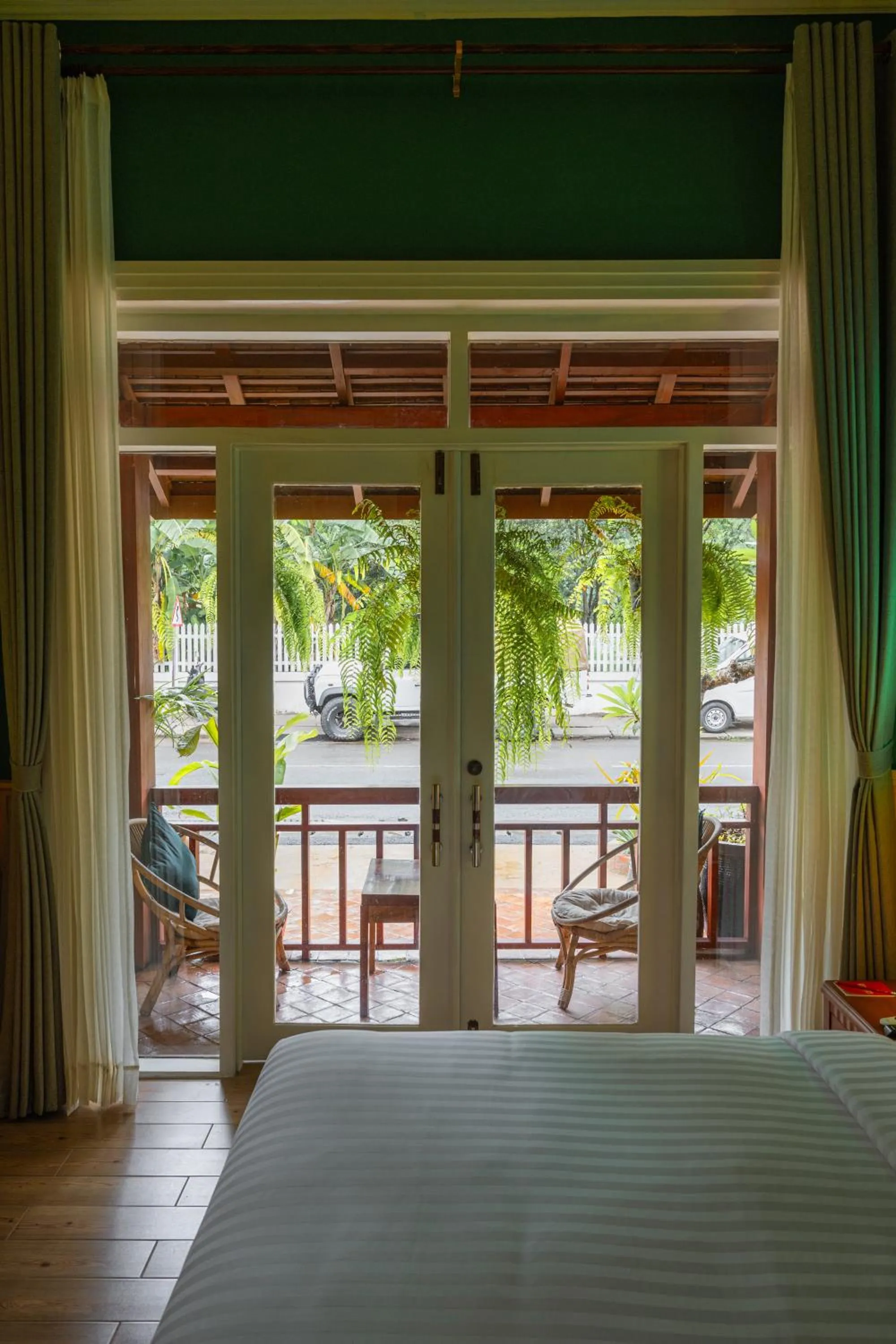Quiet street view, Bed in Senglao Boutique Hotel Luang Prabang