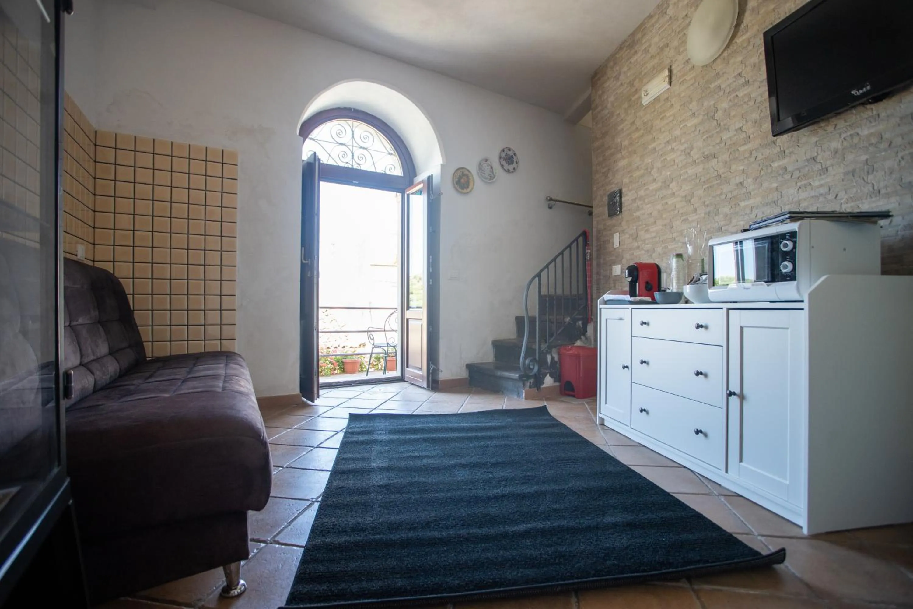 Communal lounge/ TV room in Bed and Breakfast Terra del Sole Ibla