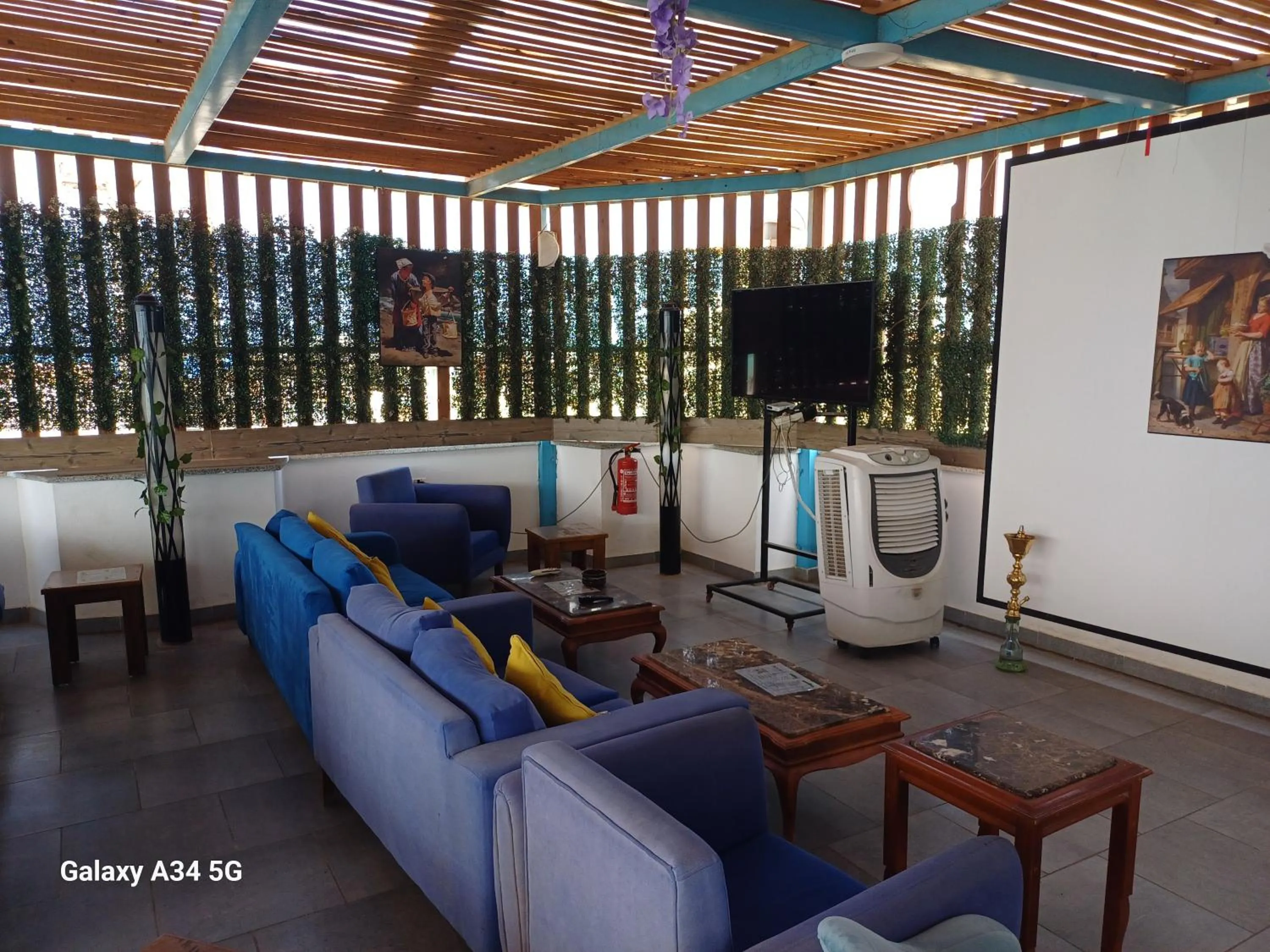 Communal lounge/ TV room in Palm Inn Hotel Hurghda