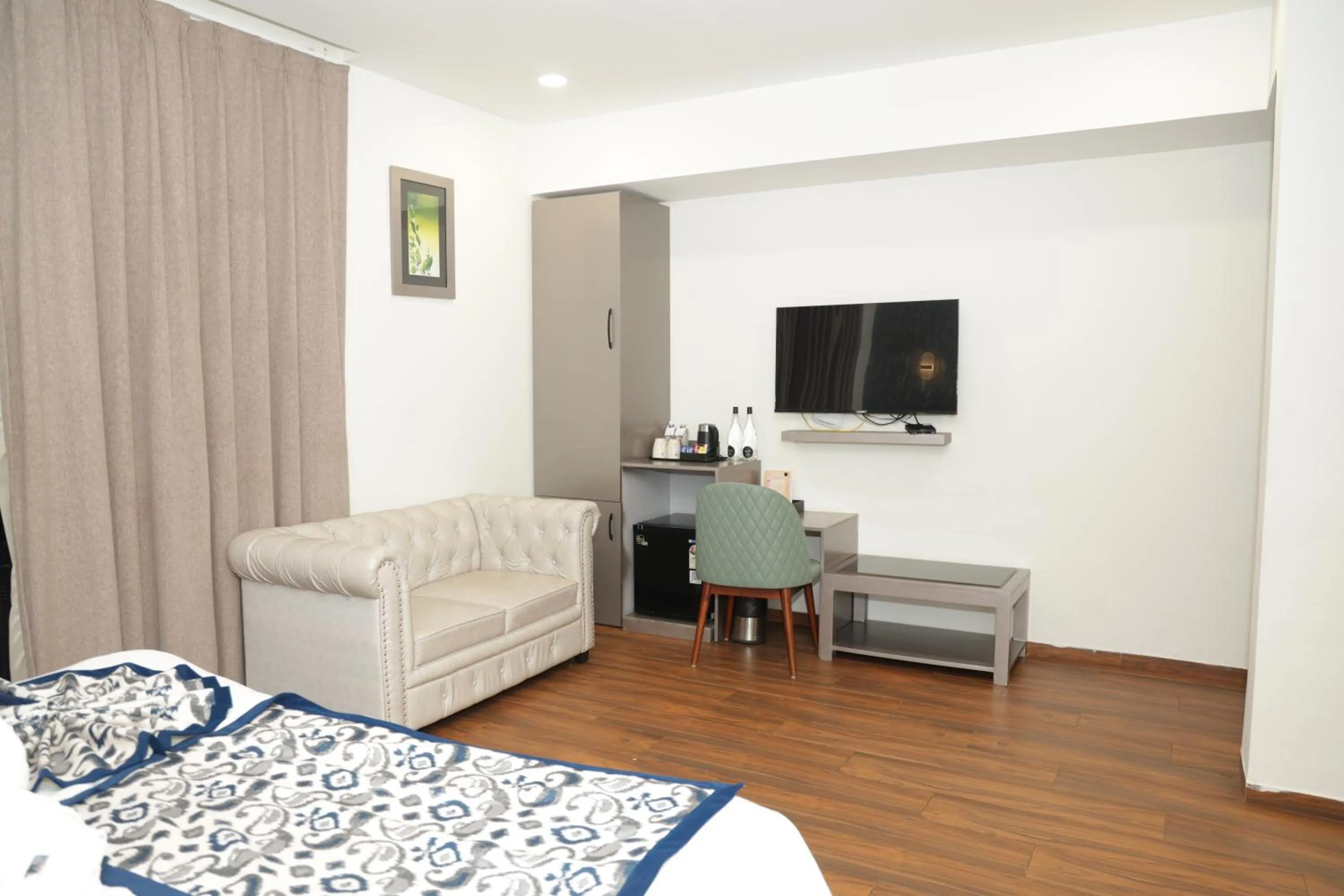 Bed in Grand Continent Anjuna A Sarovar Portico Affiliate Hotel