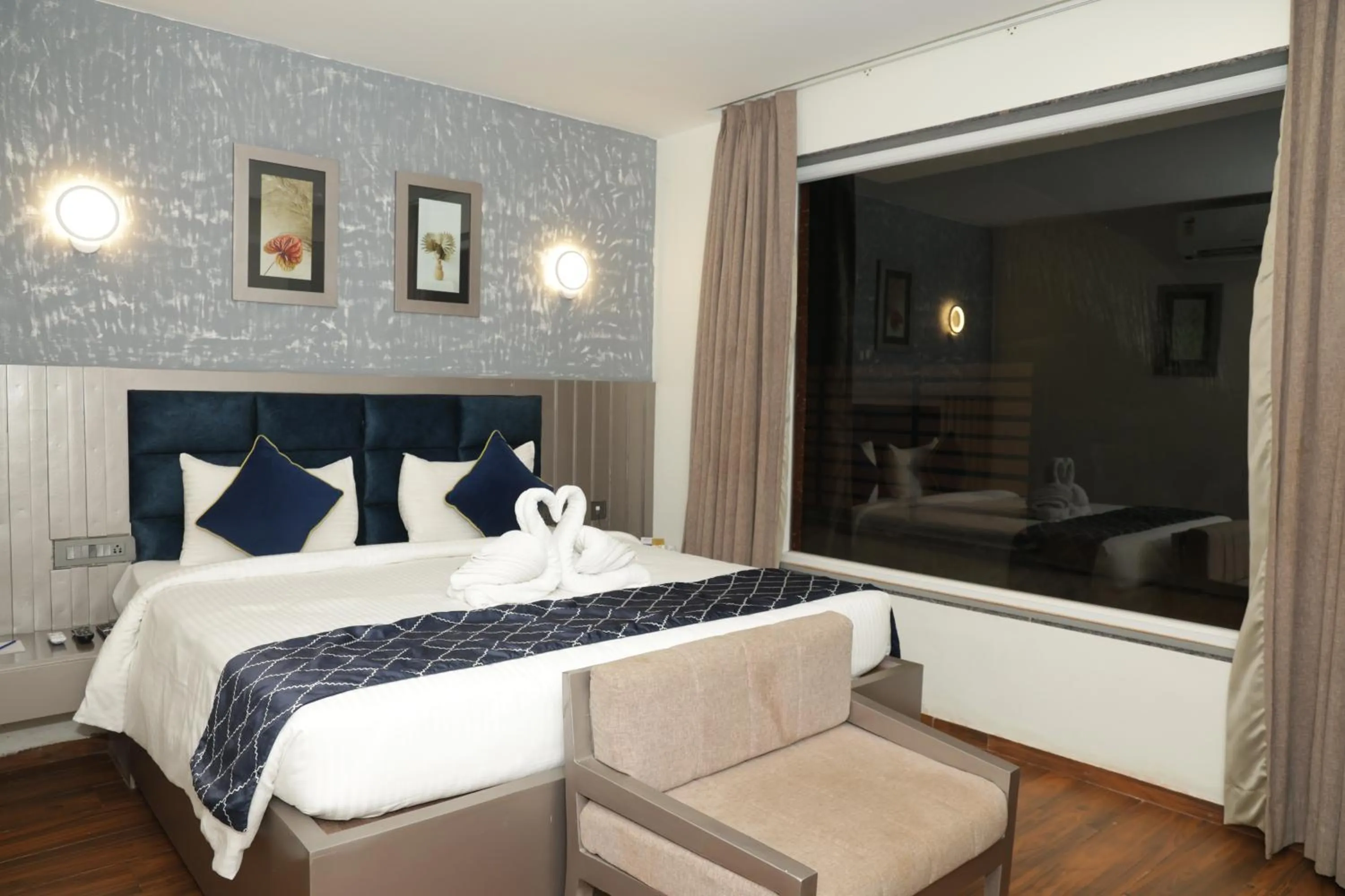 Bed in Grand Continent Anjuna A Sarovar Portico Affiliate Hotel