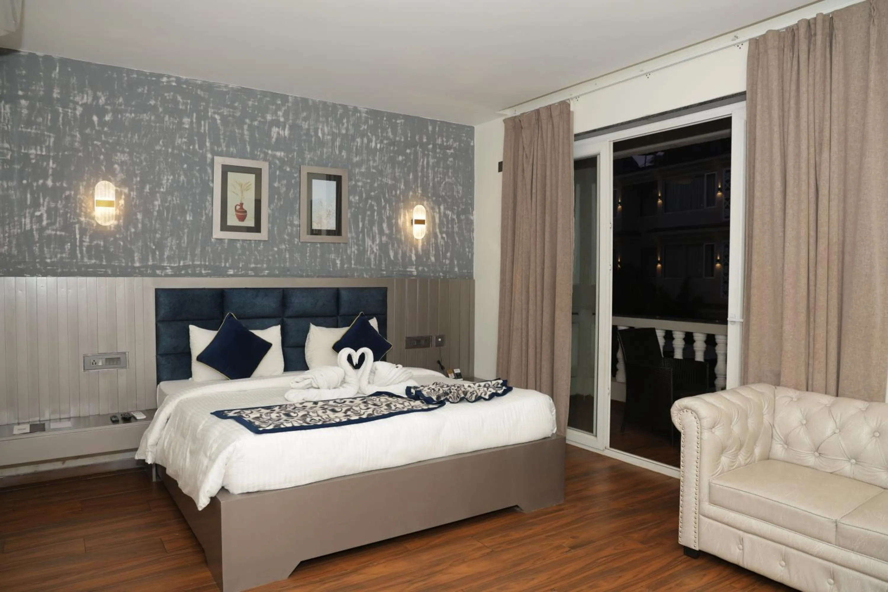 Bed in Grand Continent Anjuna A Sarovar Portico Affiliate Hotel