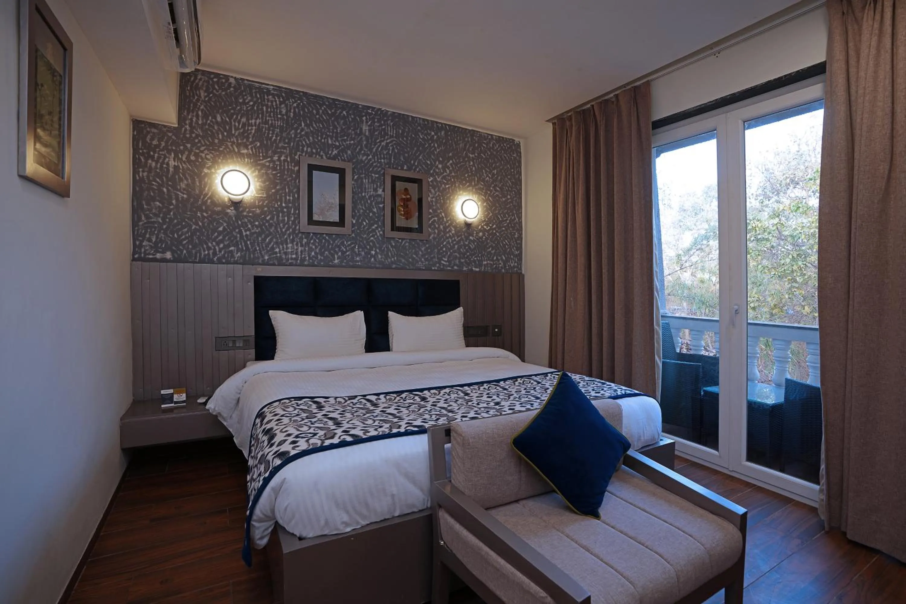 Bedroom, Bed in Grand Continent Anjuna A Sarovar Portico Affiliate Hotel