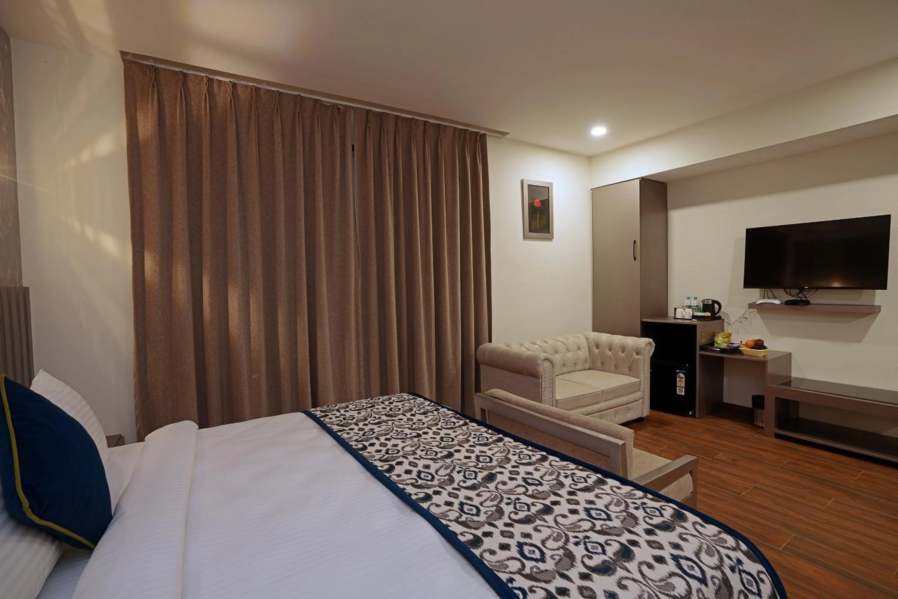 Bedroom, Bed in Grand Continent Anjuna A Sarovar Portico Affiliate Hotel