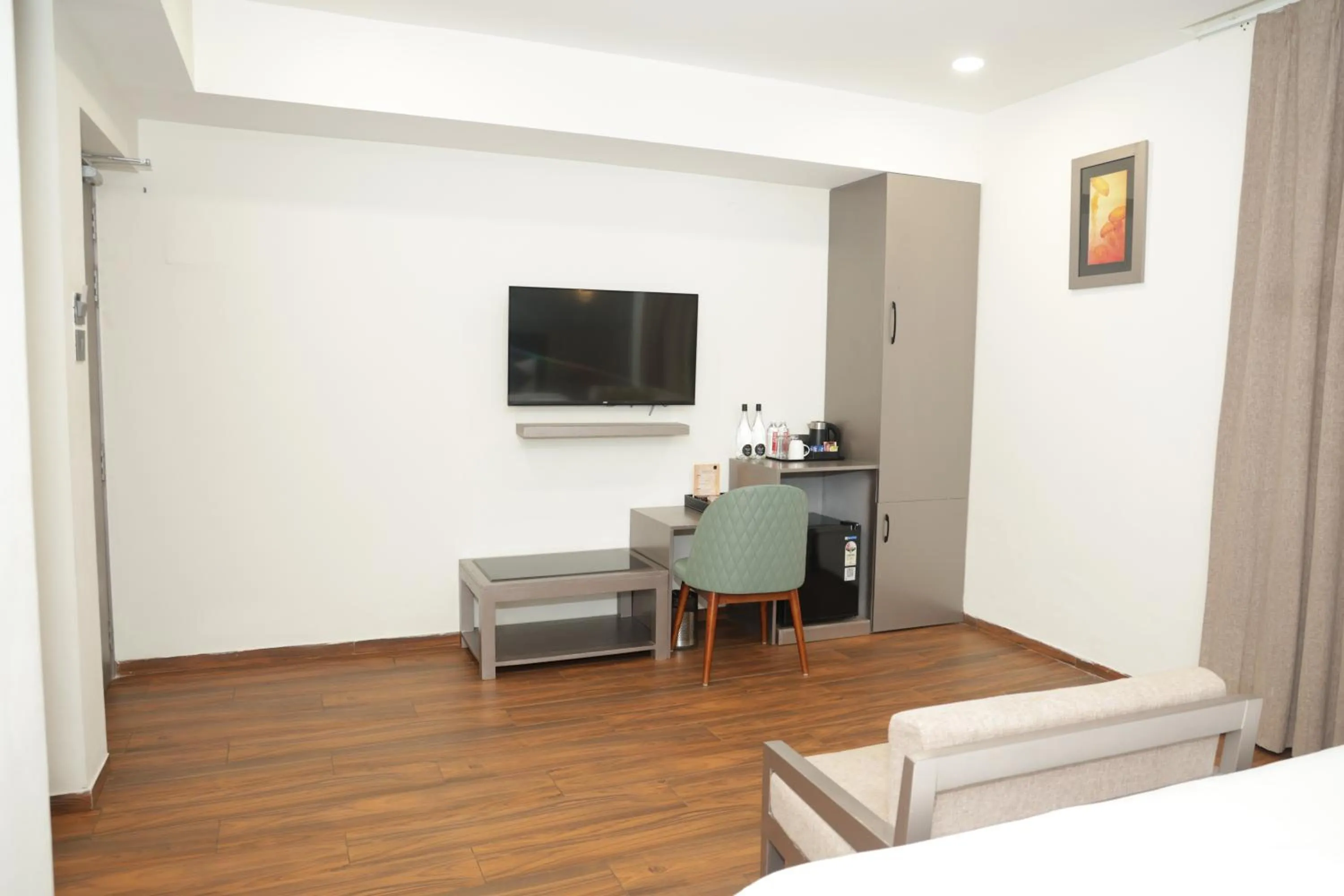 TV and multimedia in Grand Continent Anjuna A Sarovar Portico Affiliate Hotel