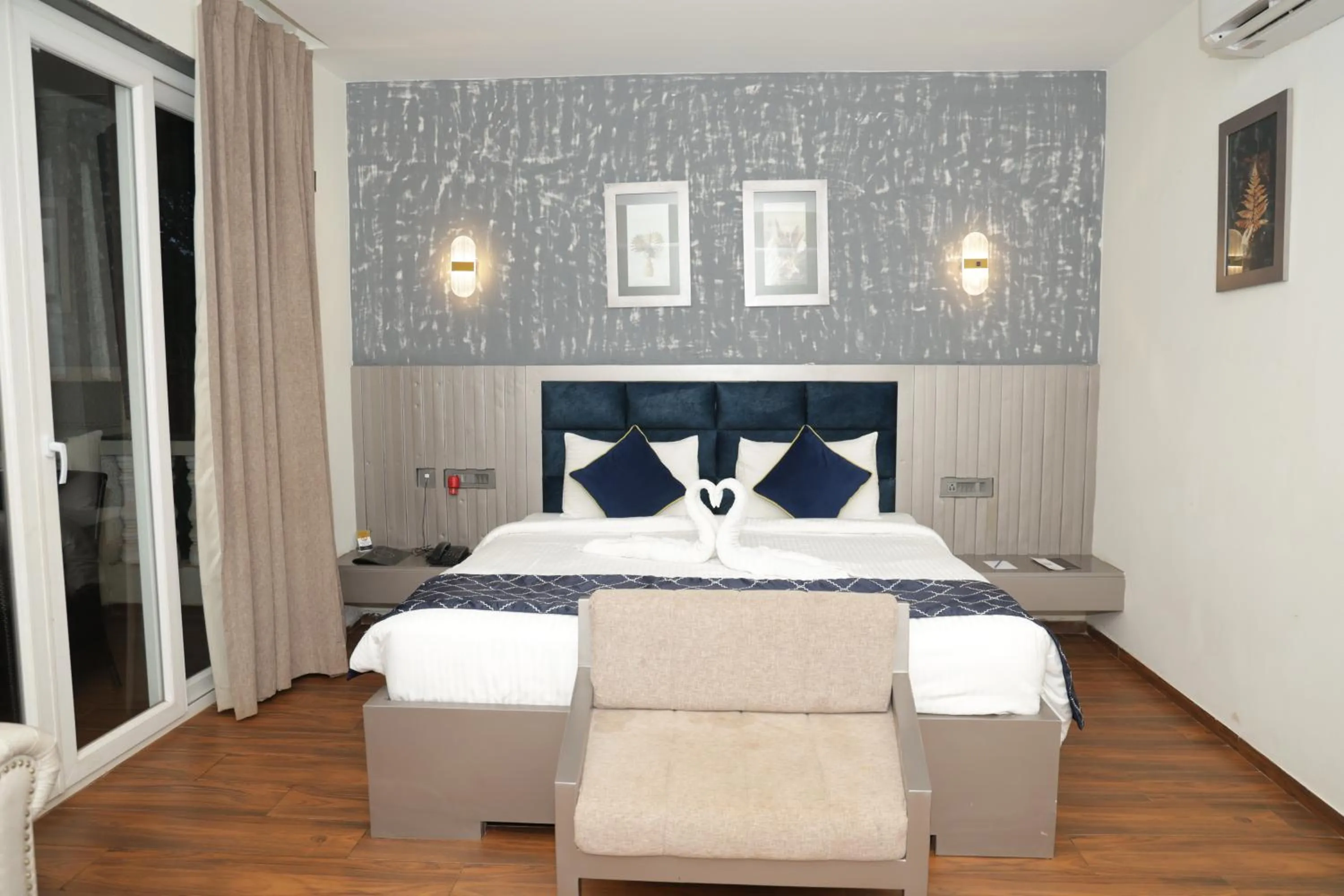 Bed in Grand Continent Anjuna A Sarovar Portico Affiliate Hotel