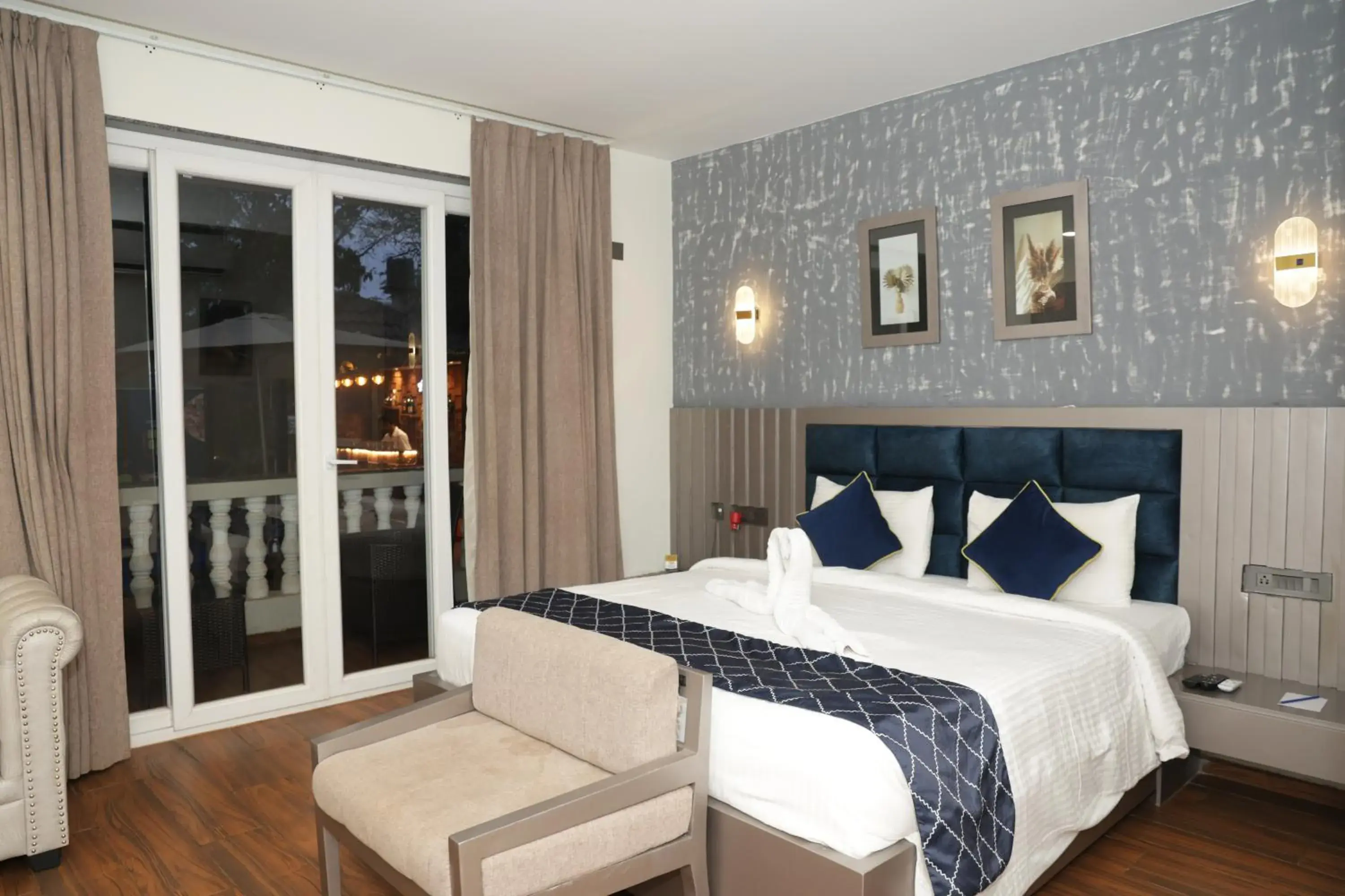 Deluxe Double Room with Private Balcony and Pool View - Full Day Happy Hours in Grand Continent Anjuna A Sarovar Portico Affiliate Hotel Deluxe Double Room with Private Balcony and Pool View - Full Day Happy Hours in Grand Continent Anjuna A Sarovar Portico Affiliate Hotel