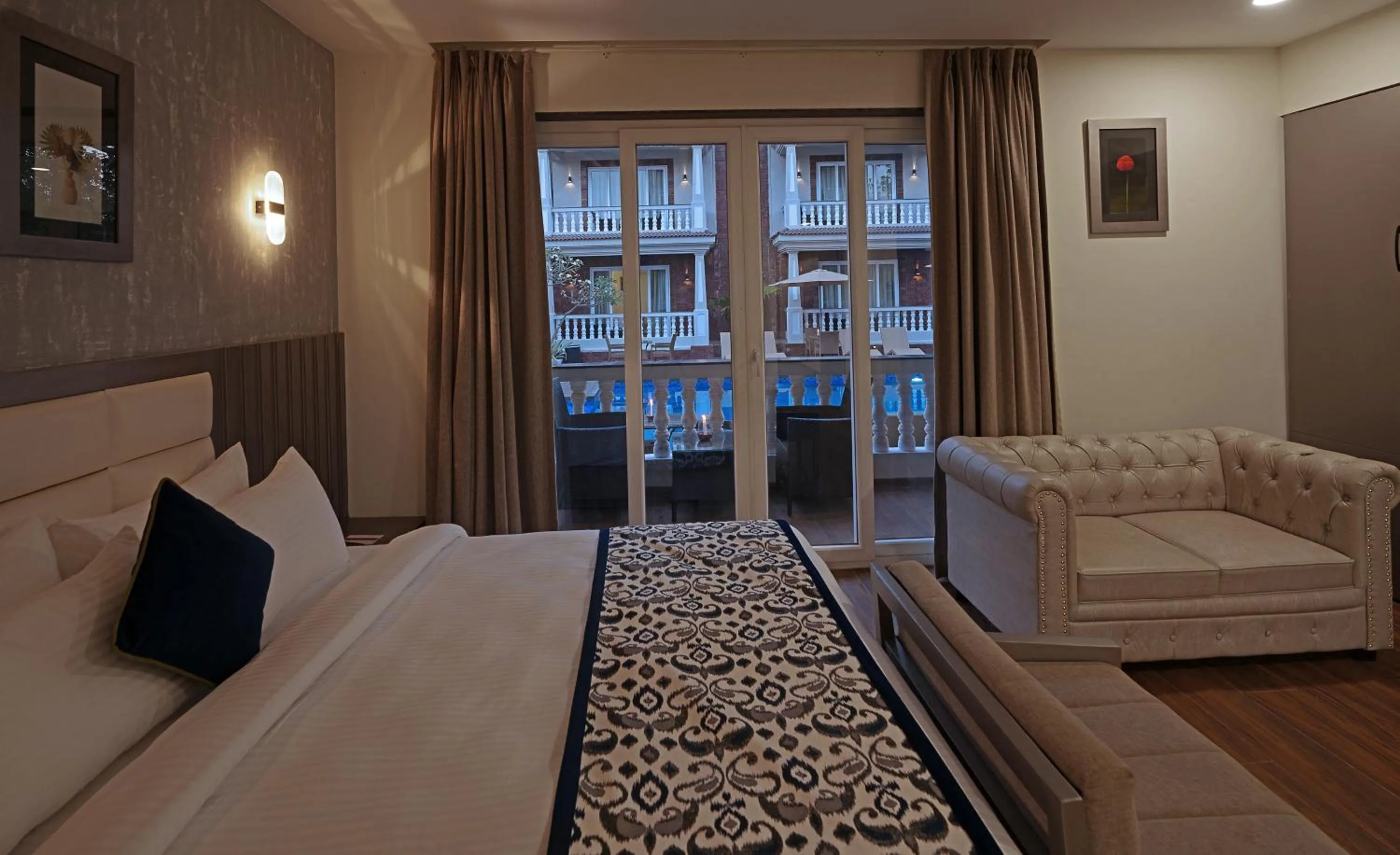 Bedroom, Bed in Grand Continent Anjuna A Sarovar Portico Affiliate Hotel