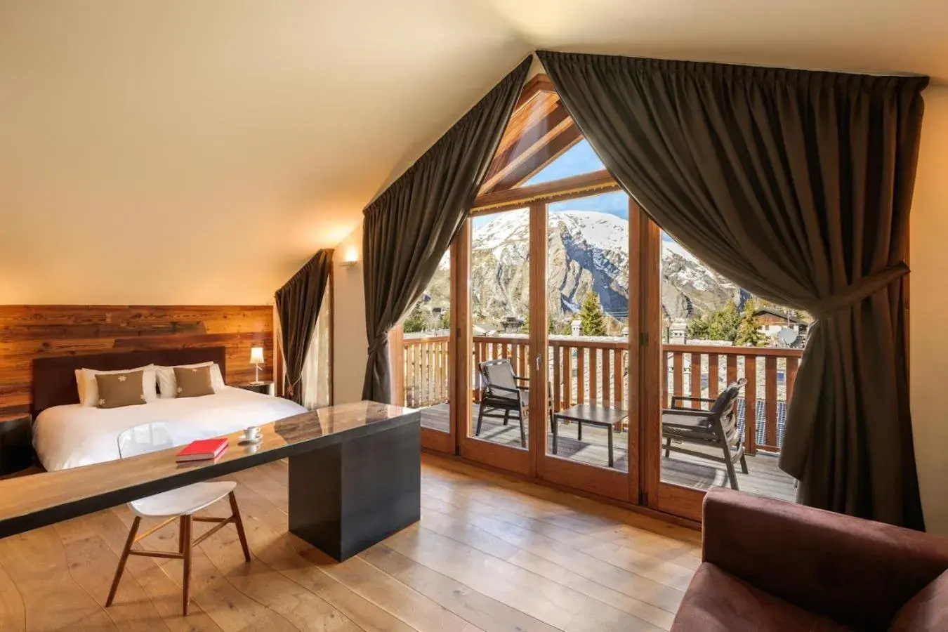 Balcony/Terrace, Bed in Montana Lodge & Spa, by R Collection Hotels Balcony/Terrace, Bed in Montana Lodge & Spa, by R Collection Hotels