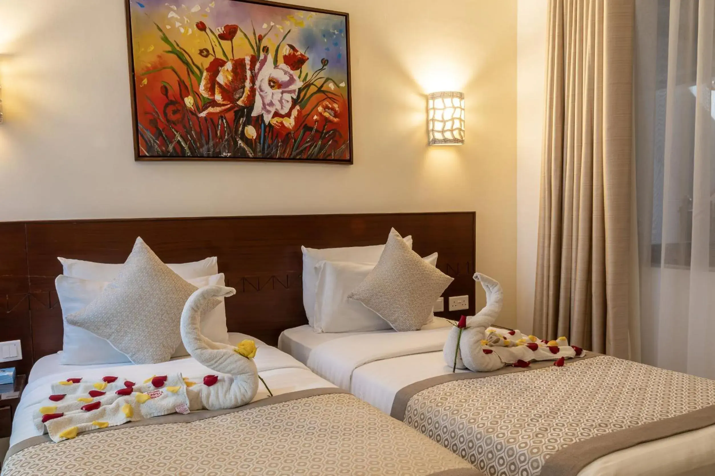 Bed in PrideInn Hotel Diani Bed in PrideInn Hotel Diani