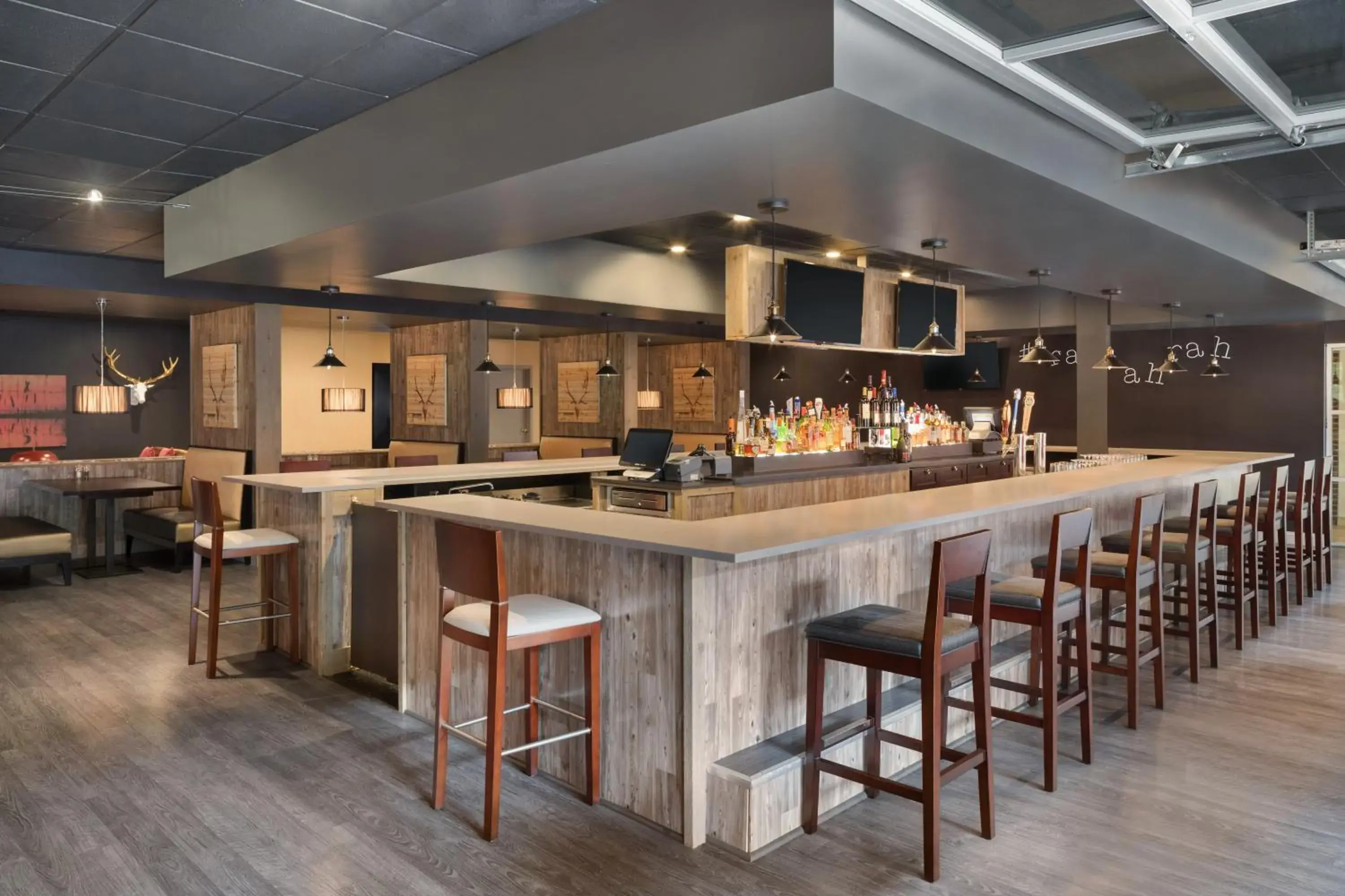 Lounge or bar in Ramada by Wyndham Beaver Falls Lounge or bar in Ramada by Wyndham Beaver Falls