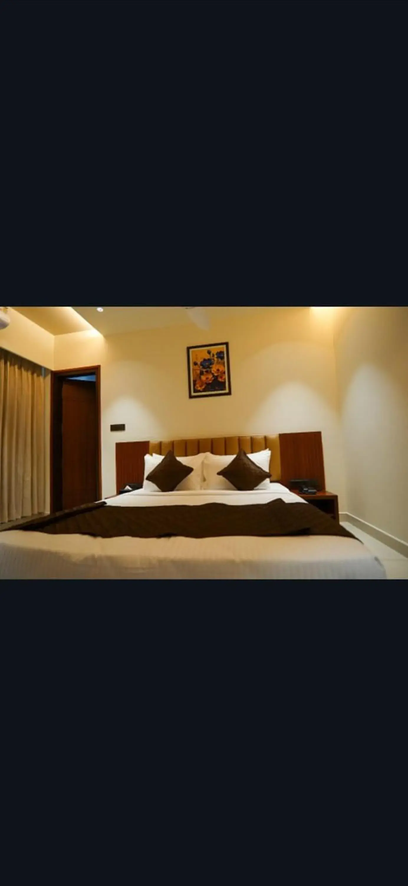 Bed in Hotel Harigovindas Express Mysore Bed in Hotel Harigovindas Express Mysore