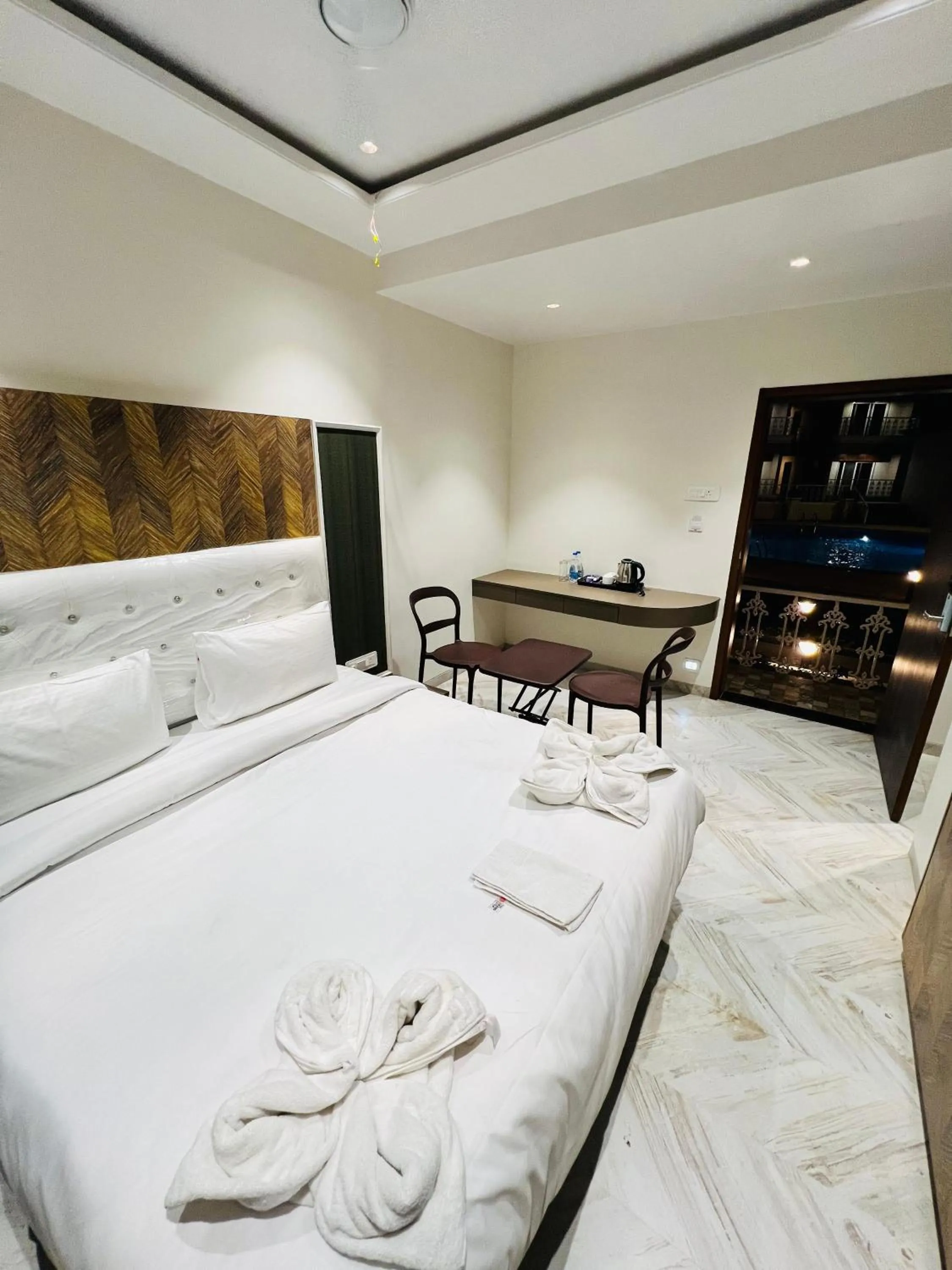 Bed in The Grand Leela Resort