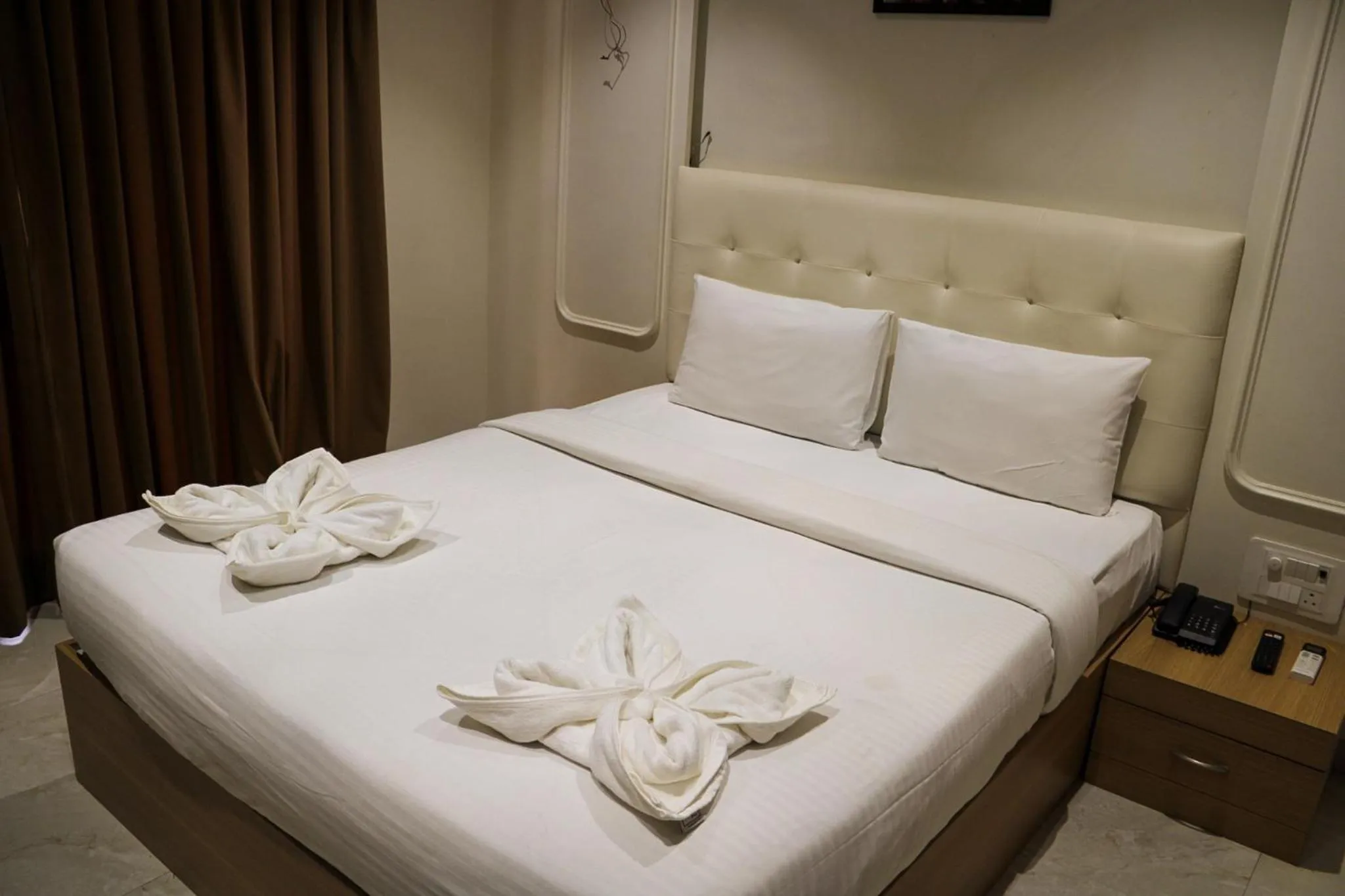 Bed in The Grand Leela Resort