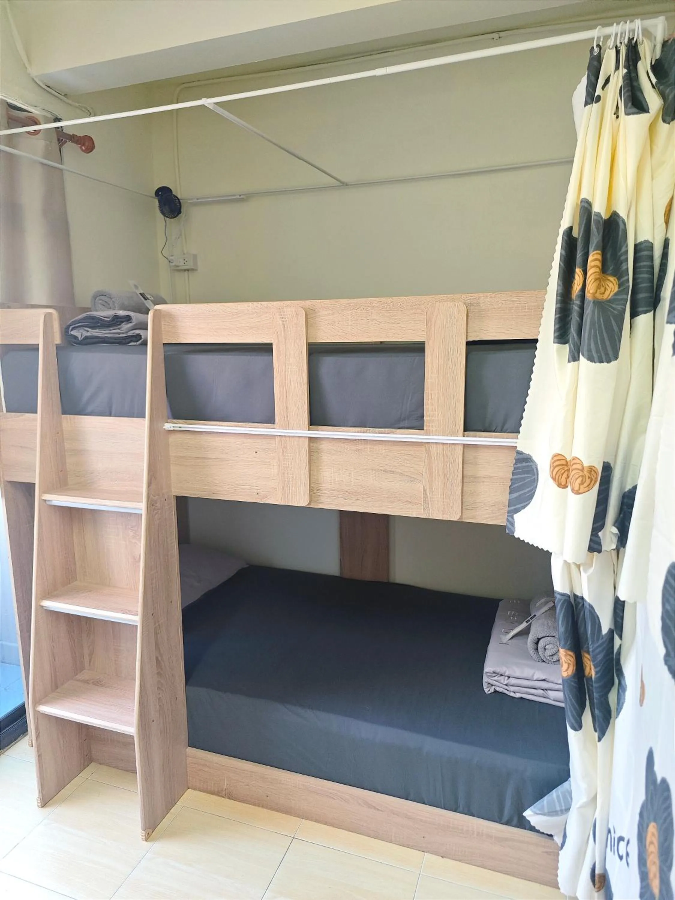 Bed in Panda Lodge Home Stay