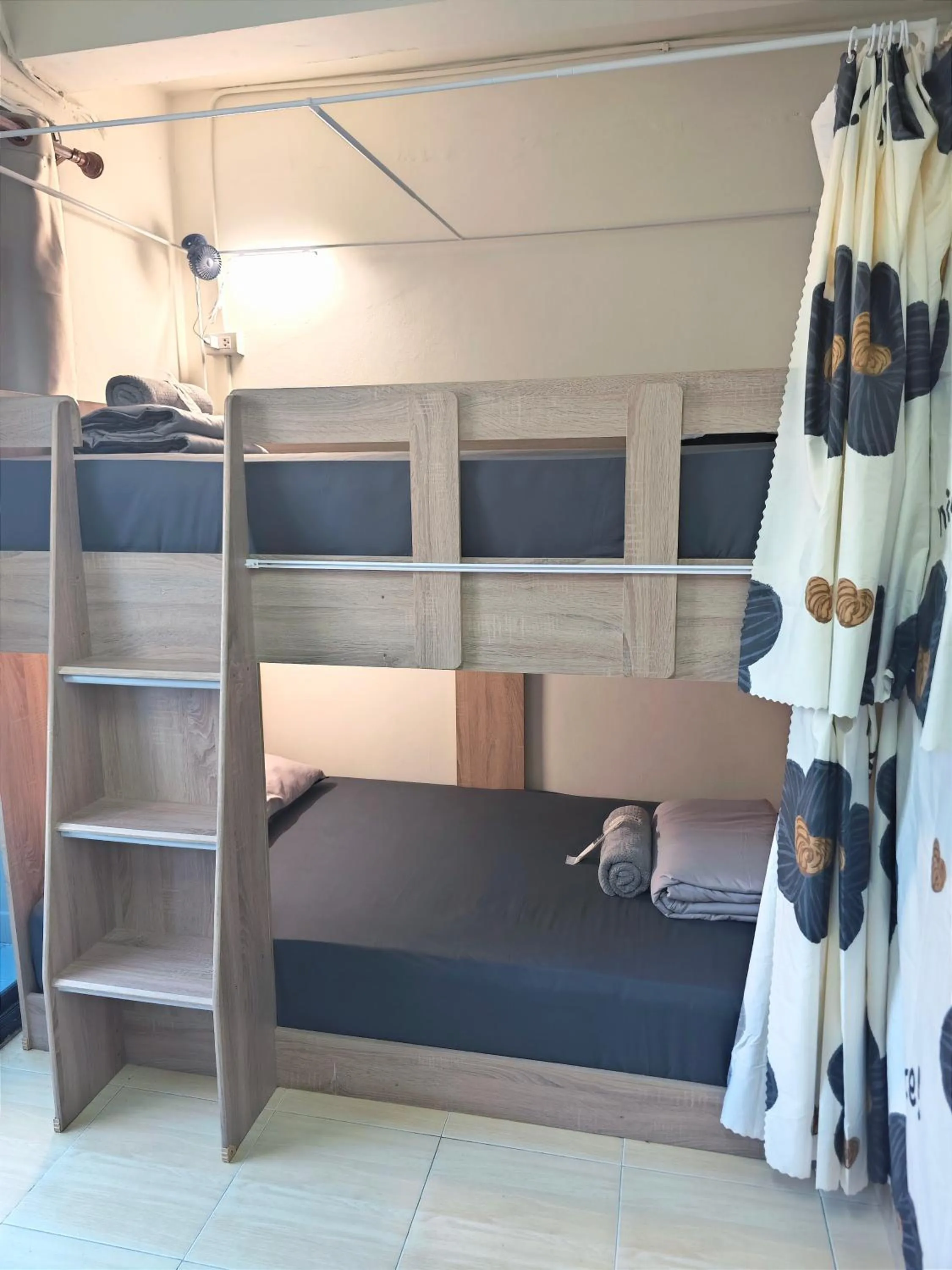 Bed in Panda Lodge Home Stay