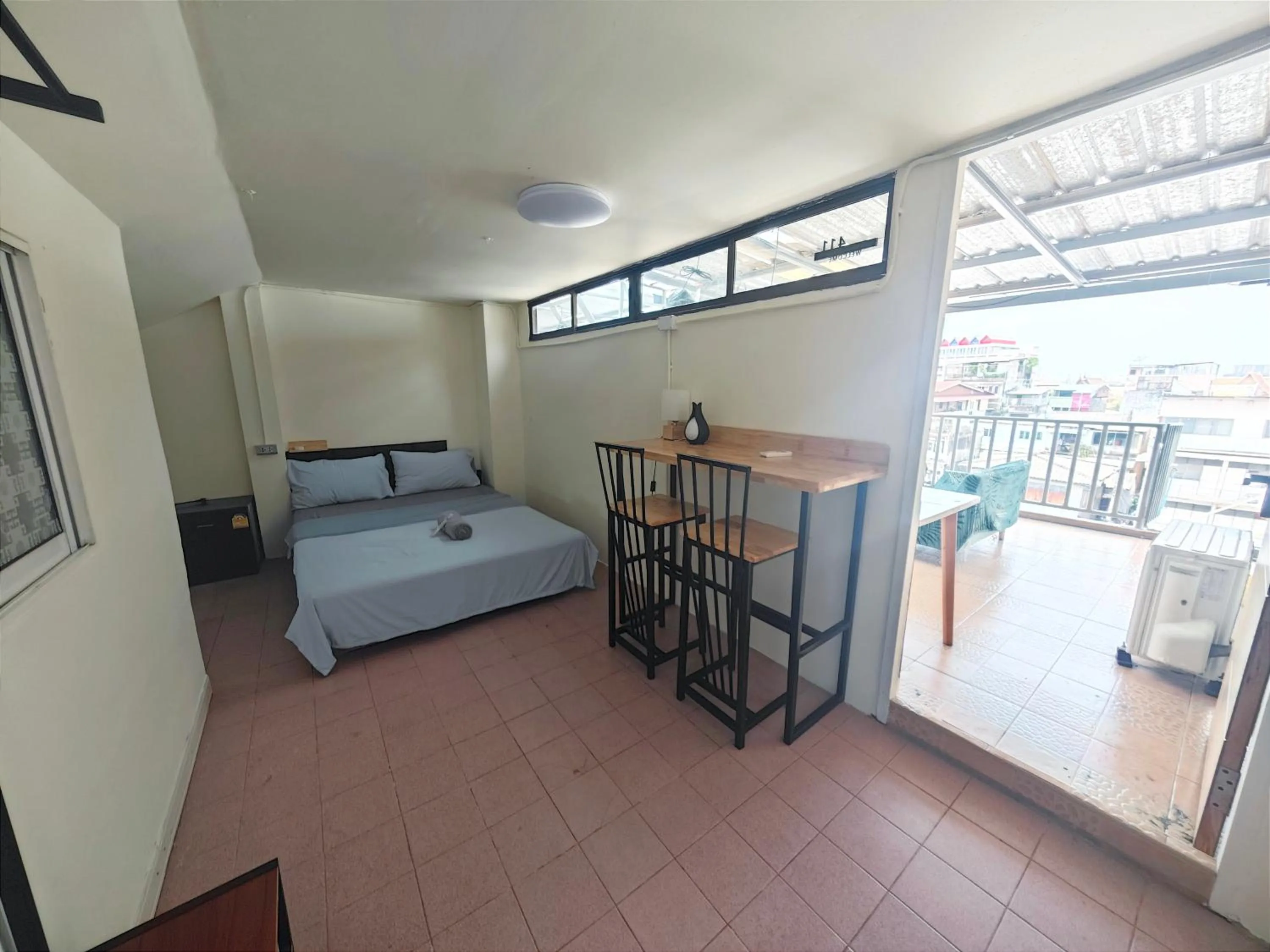 Bed in Panda Lodge Home Stay