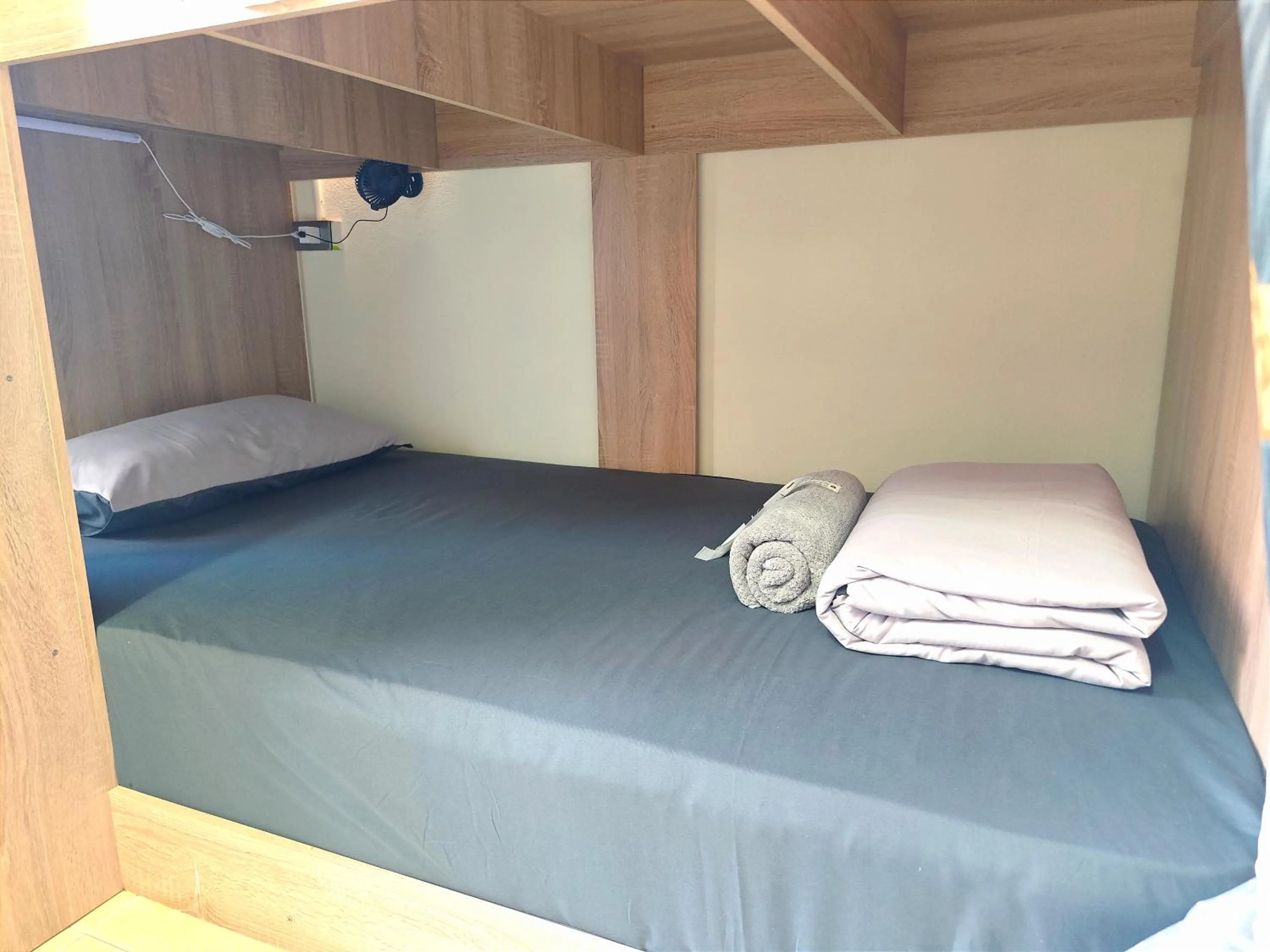 Bed in Panda Lodge Home Stay