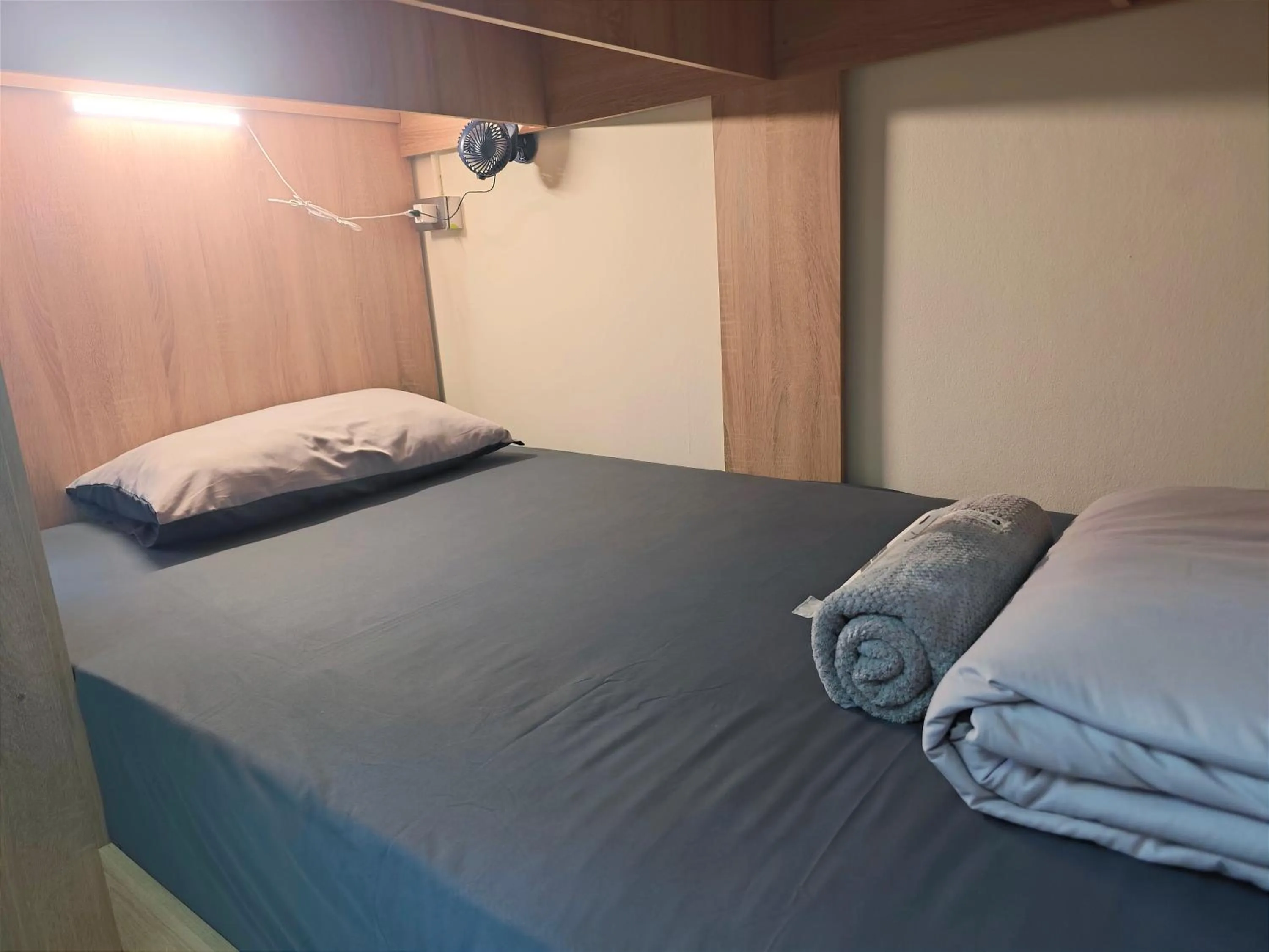 Bed in Panda Lodge Home Stay