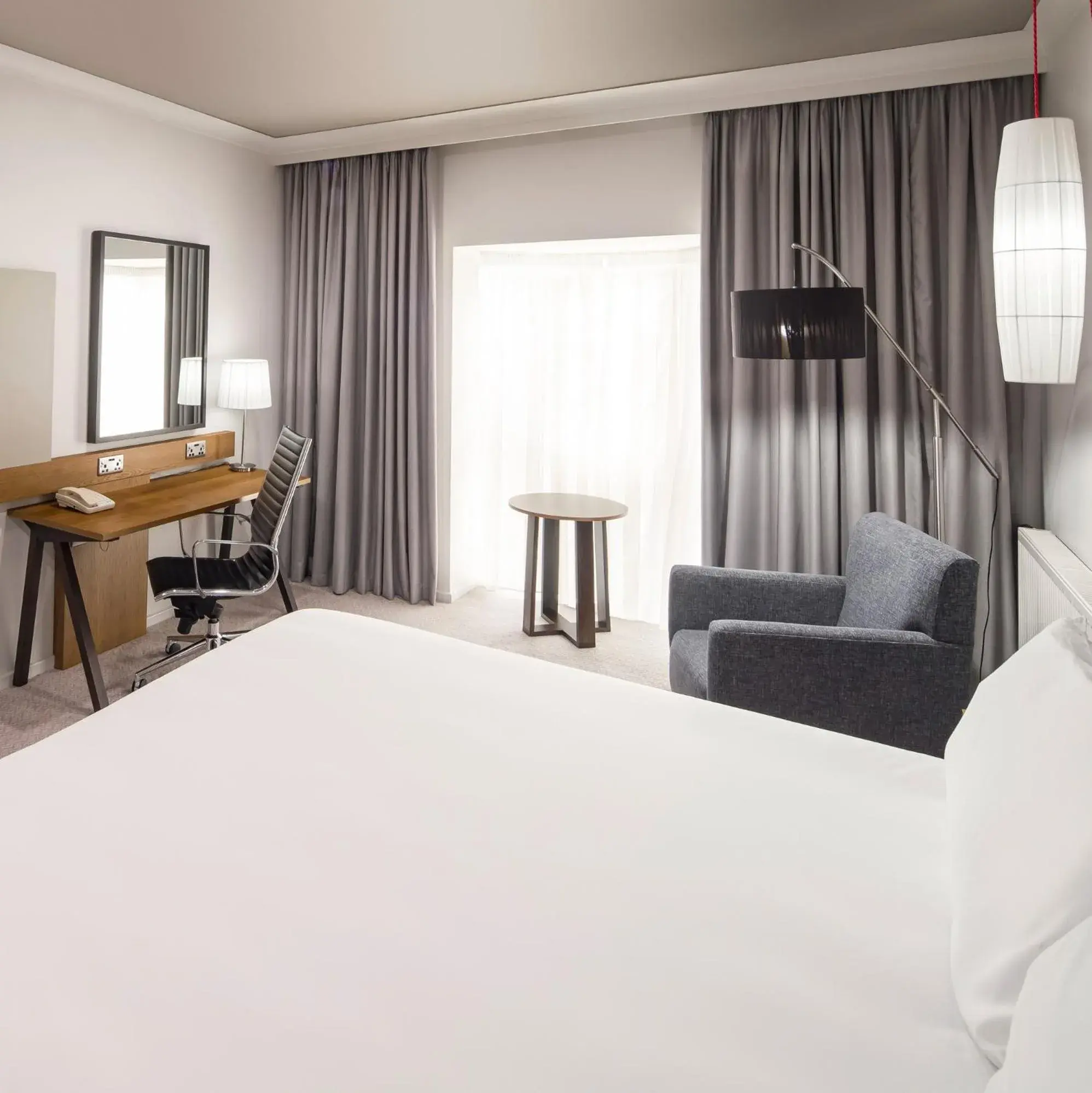 Seating area, Bed in Crowne Plaza Solihull by IHG Seating area, Bed in Crowne Plaza Solihull by IHG