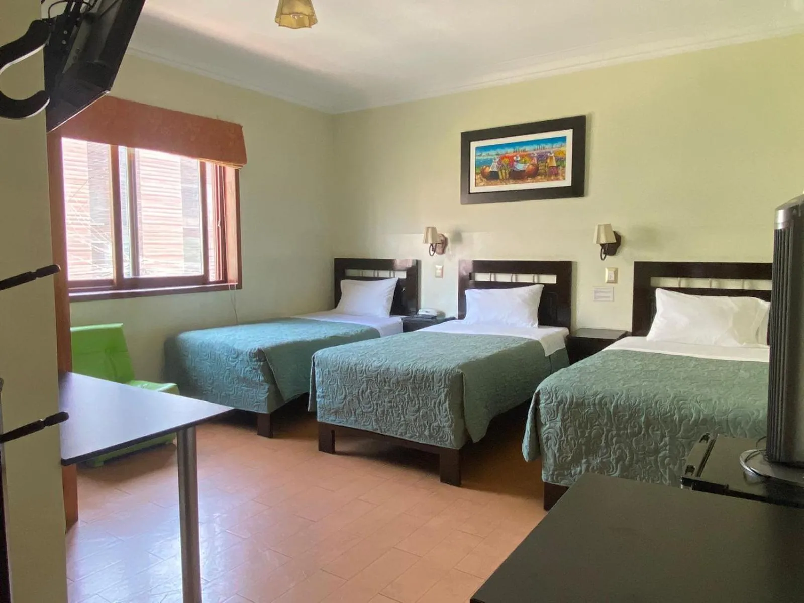 Bed in Hotel Tinkus Inn