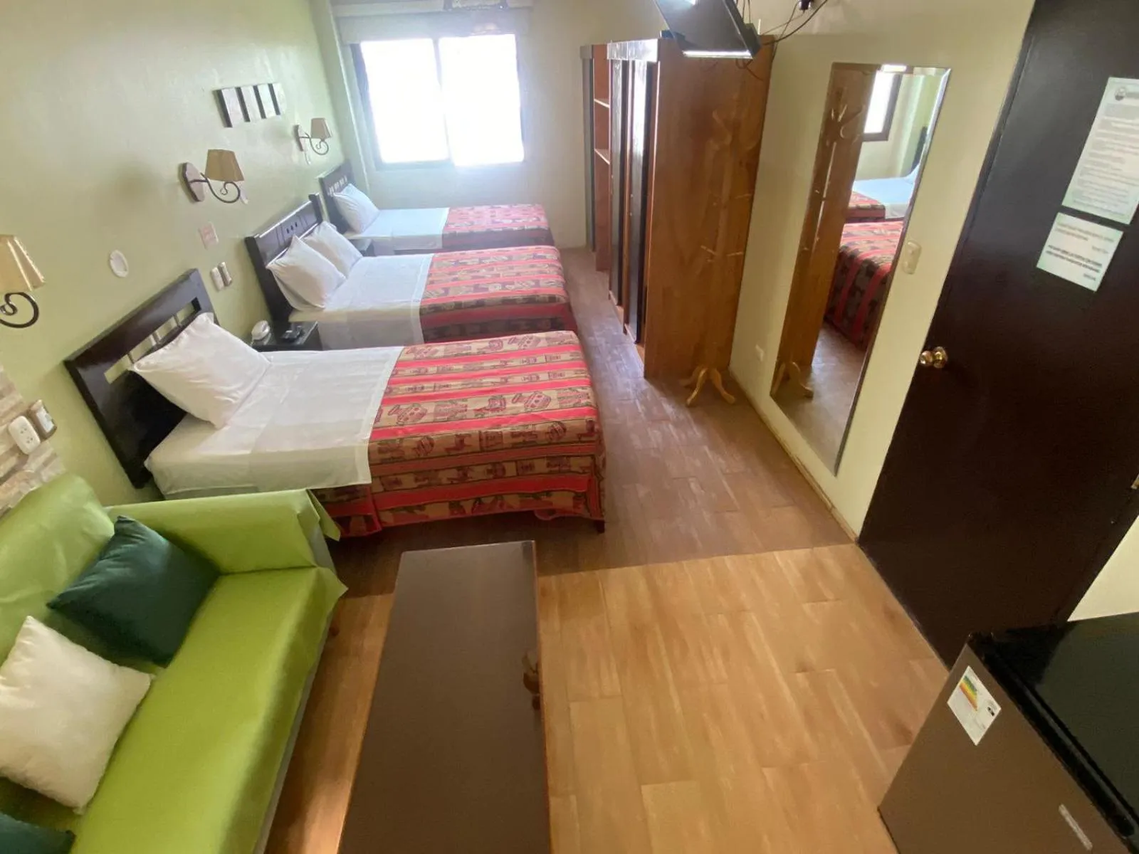 Bed in Hotel Tinkus Inn