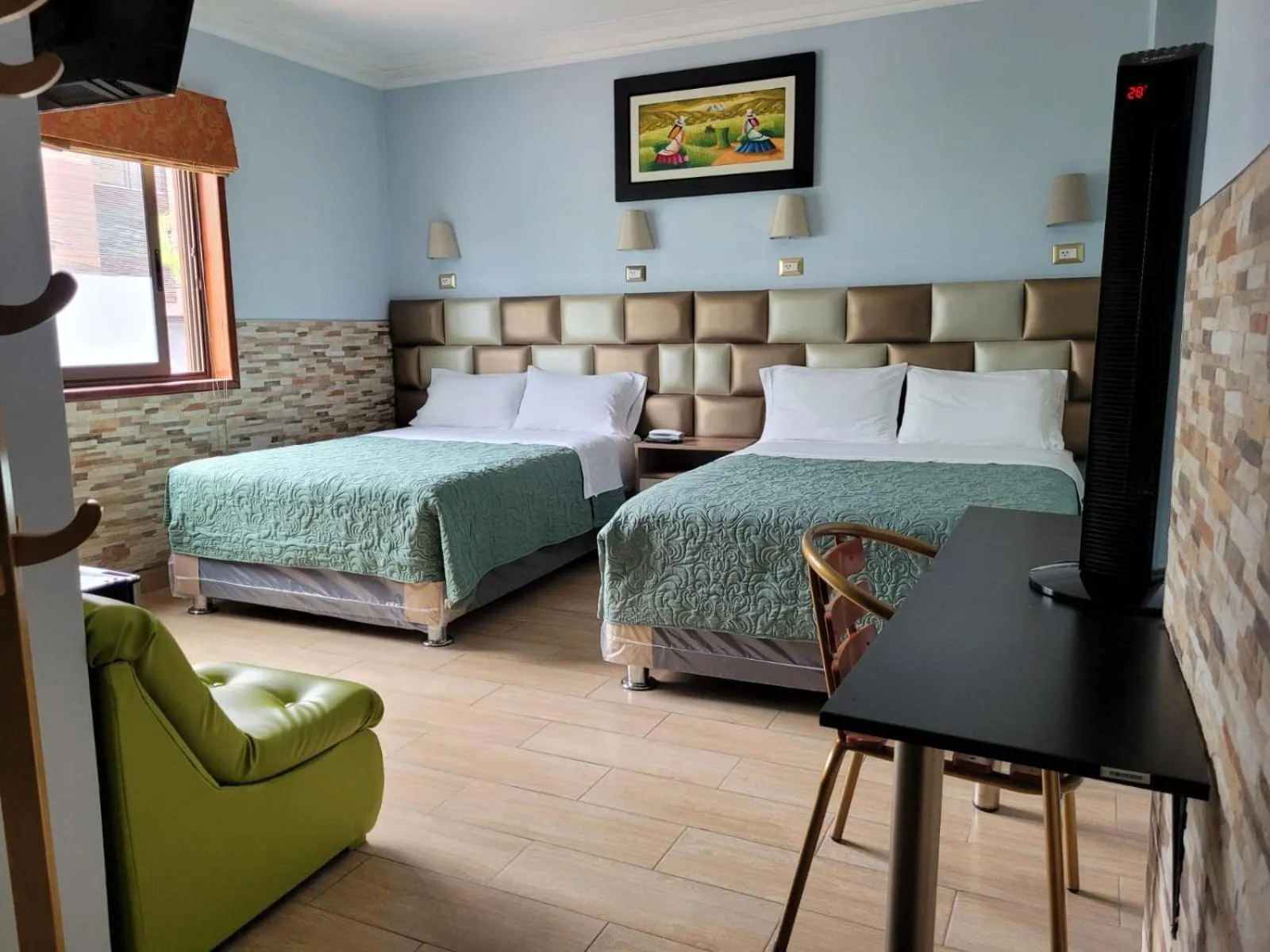 Bed in Hotel Tinkus Inn