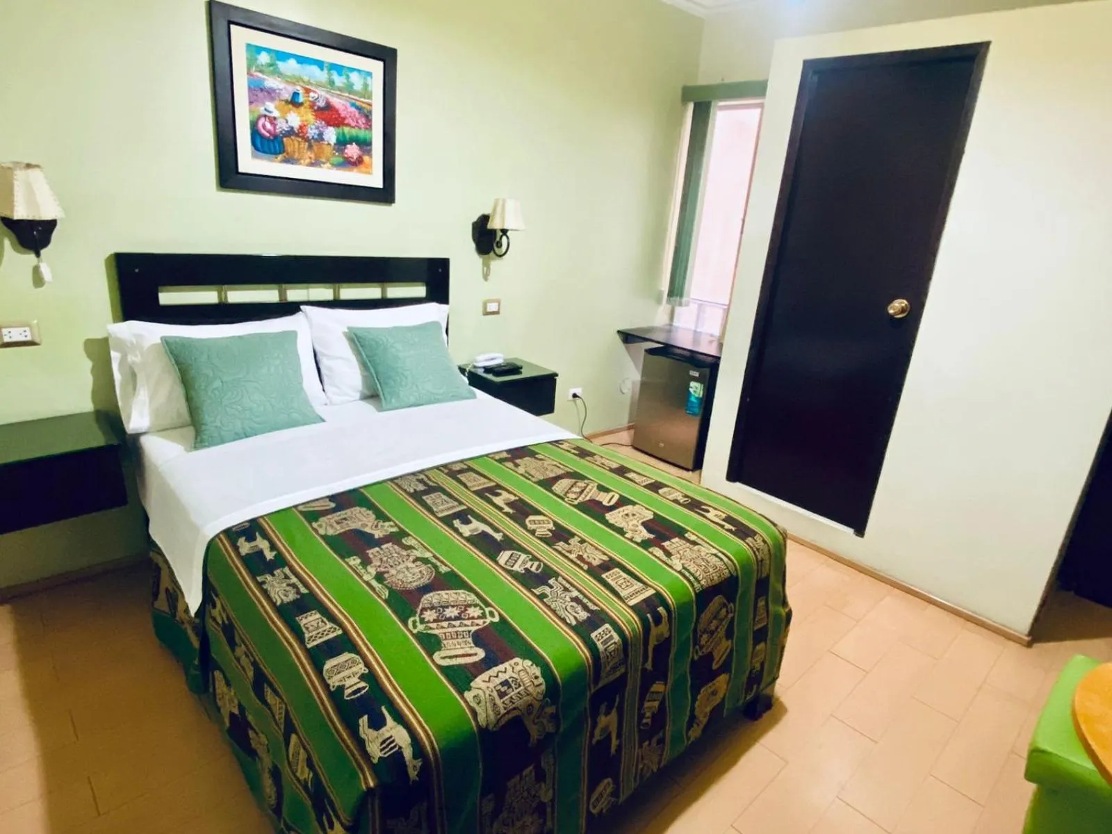 Bed in Hotel Tinkus Inn