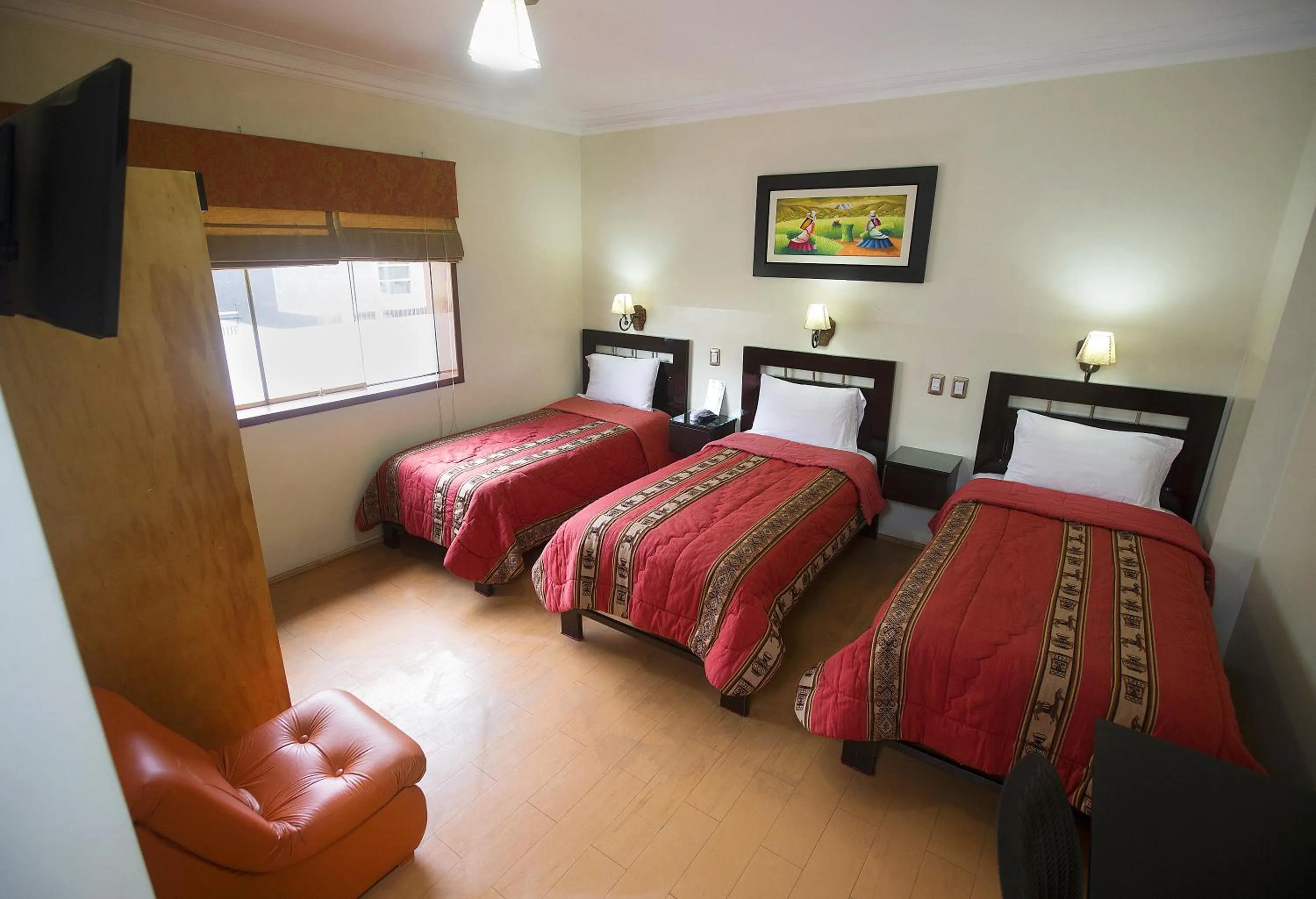 Bed in Hotel Tinkus Inn