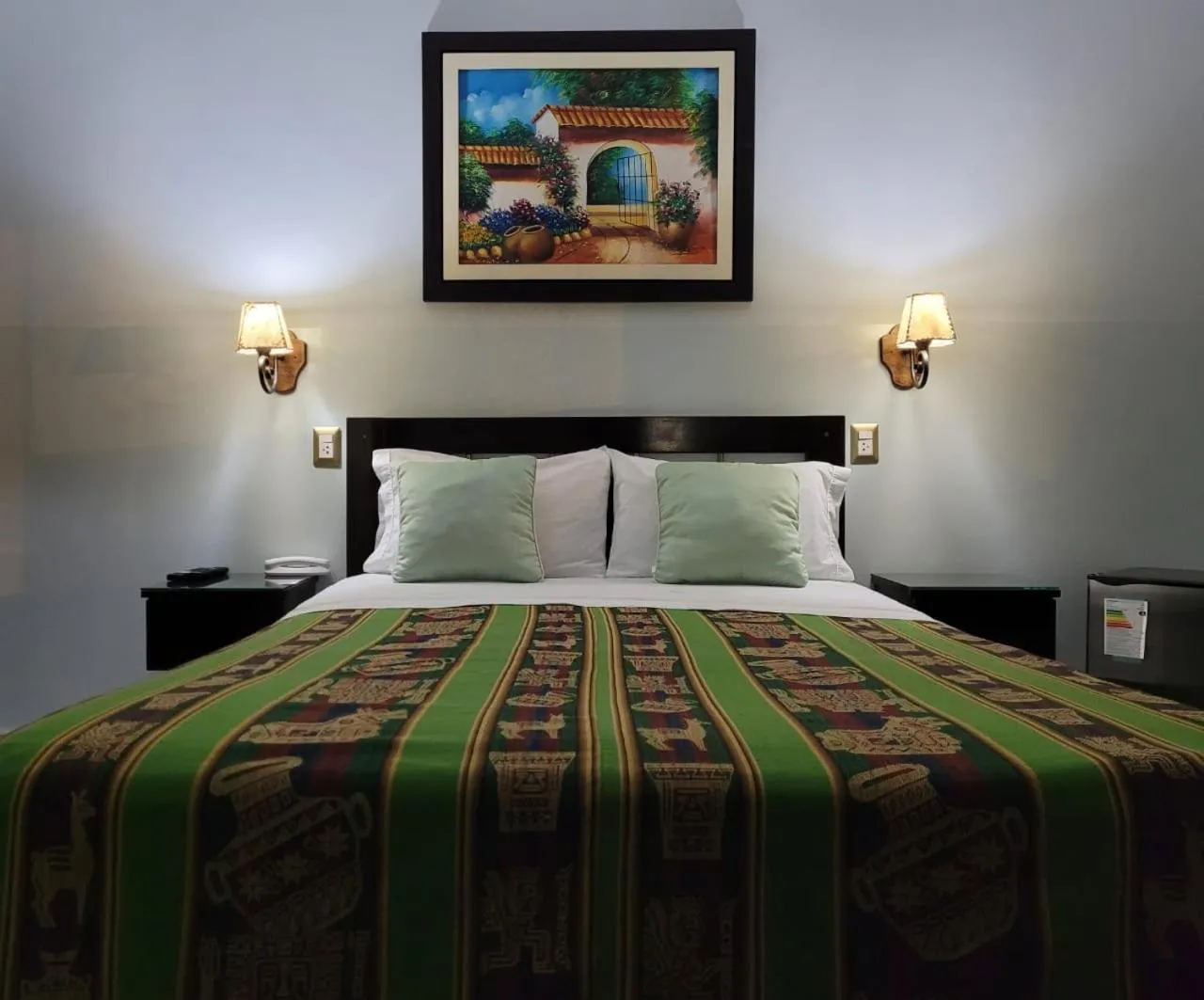 Bed in Hotel Tinkus Inn