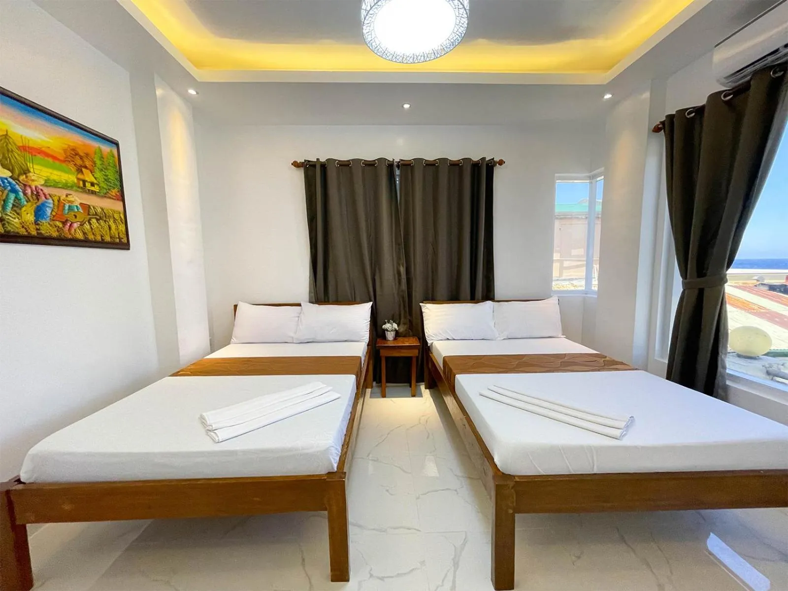 Bed in Agbing Seaside View Resort Puerto Galera powered by Cocotel