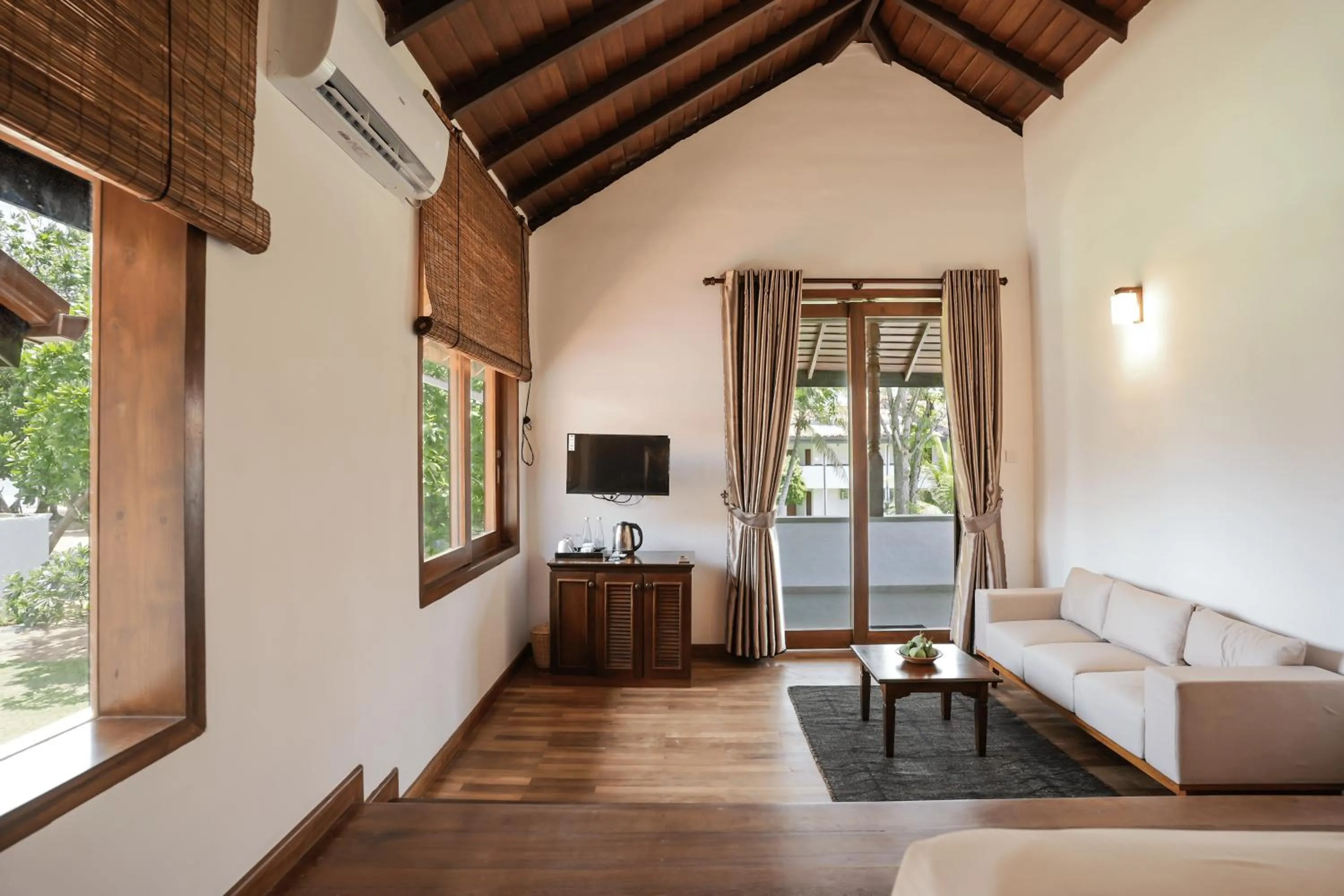Bedroom in Hibiscus Beach Hotel & Villas