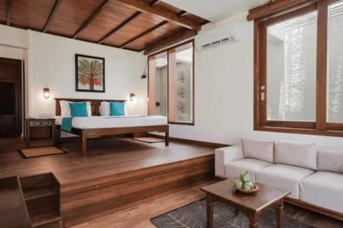 Bed in Hibiscus Beach Hotel & Villas