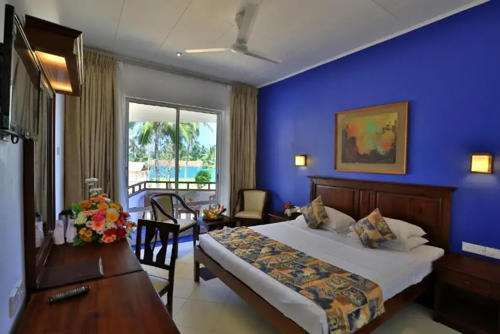 Bed in Hibiscus Beach Hotel & Villas Bed in Hibiscus Beach Hotel & Villas